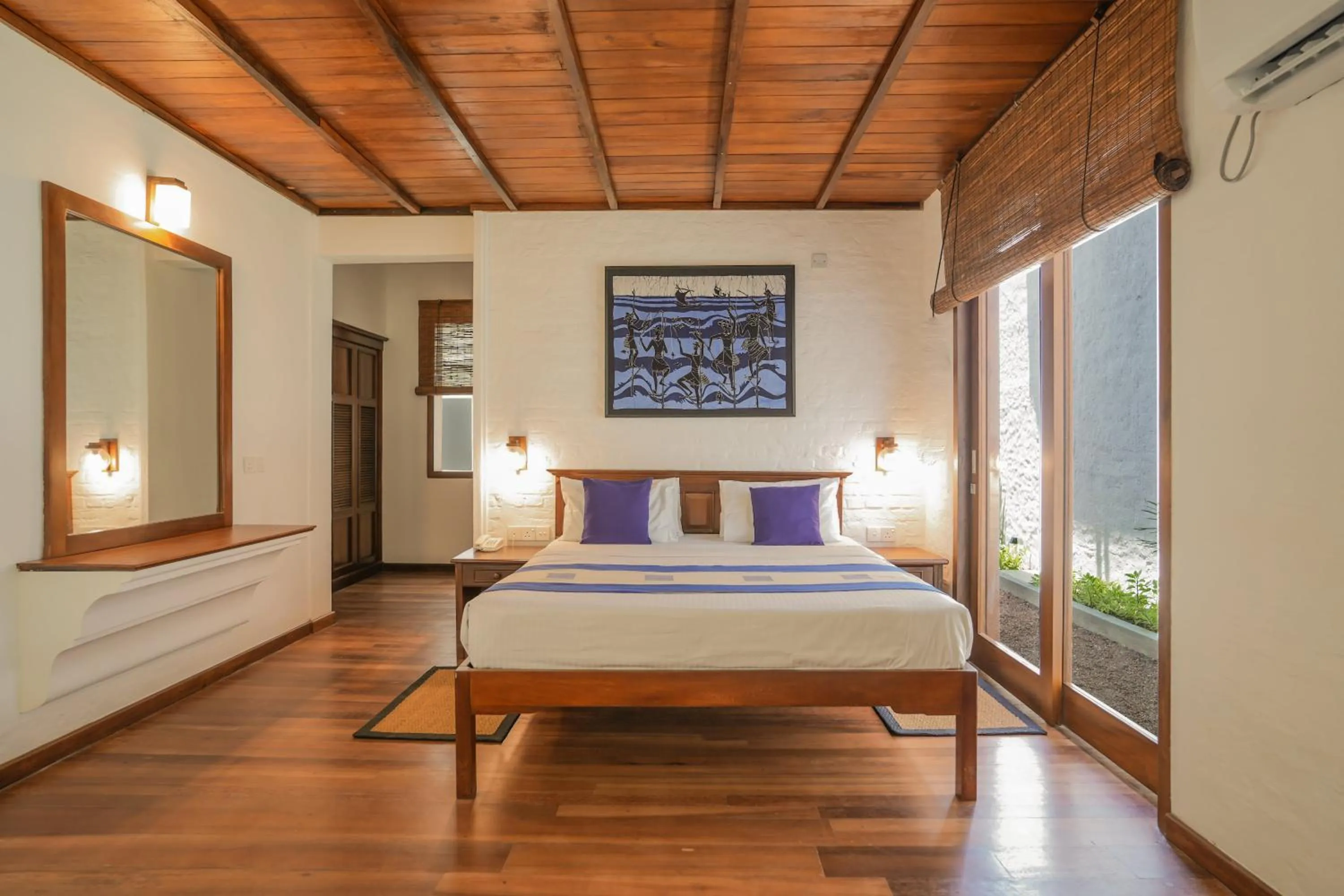 Bed in Hibiscus Beach Hotel & Villas