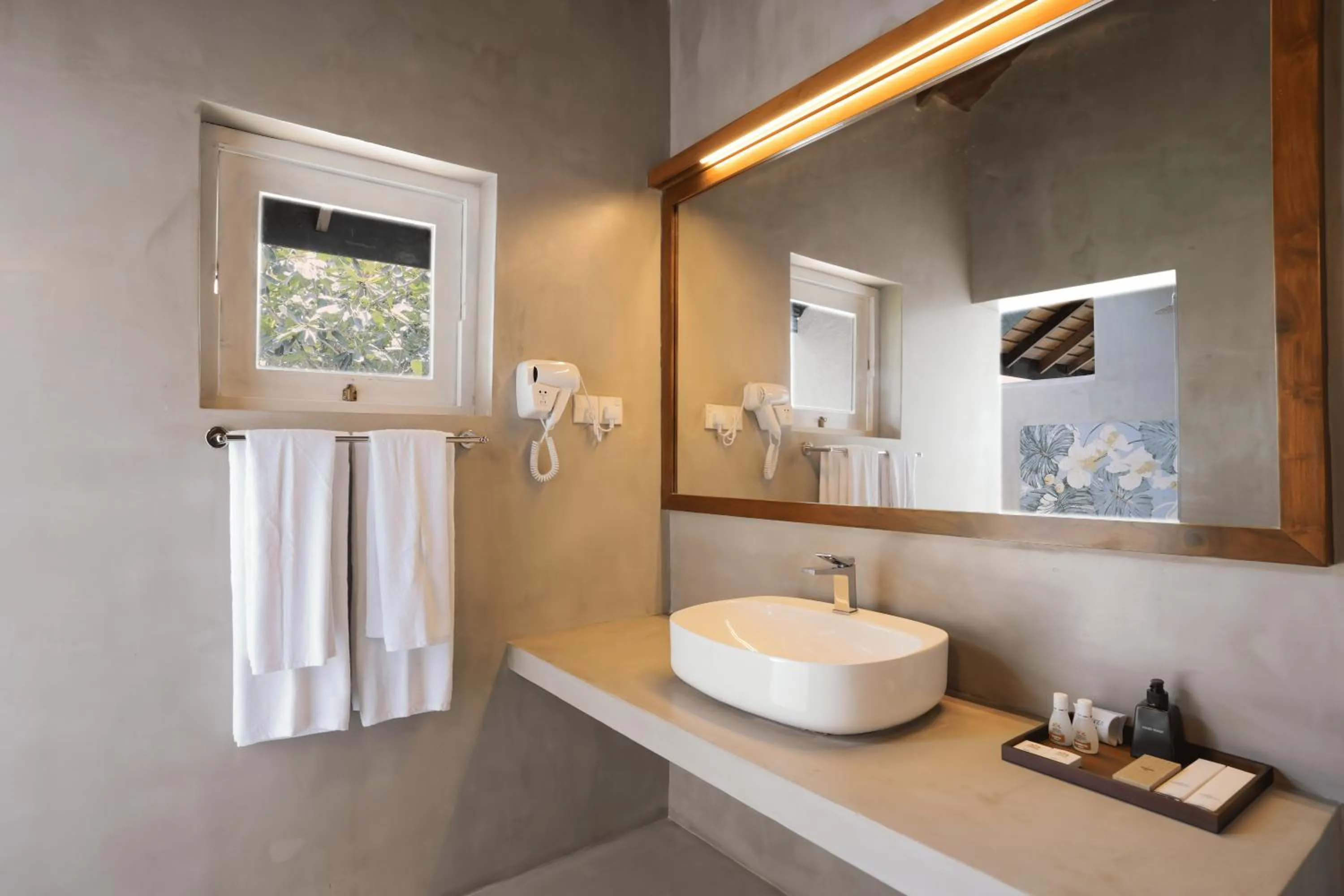Bathroom in Hibiscus Beach Hotel & Villas
