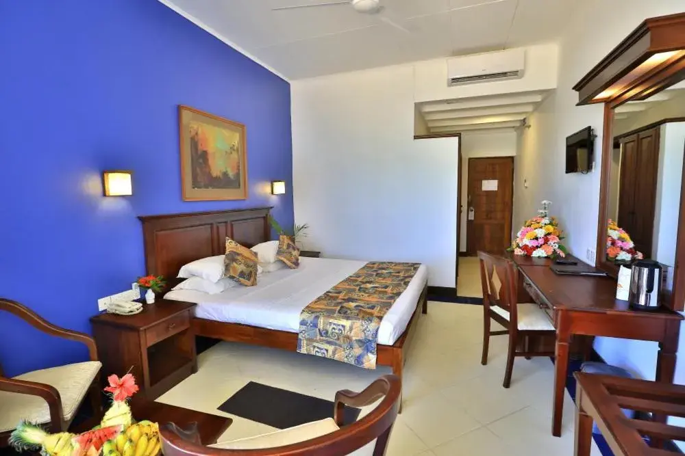 Deluxe Double or Twin Room in Hibiscus Beach Hotel & Villas Deluxe Double or Twin Room in Hibiscus Beach Hotel & Villas