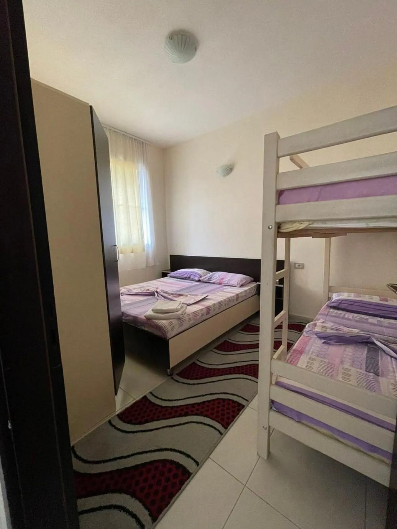 Bed in Aparthotel Vila Tufi
