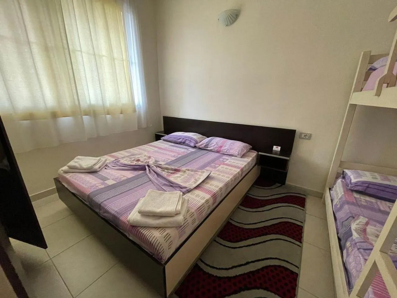 Bed in Aparthotel Vila Tufi