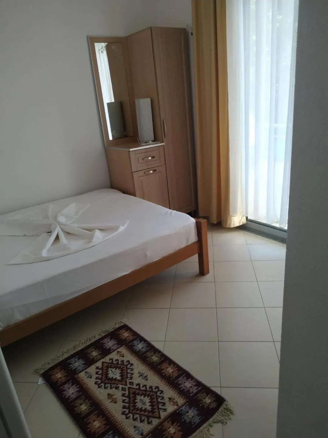Bed in Aparthotel Vila Tufi