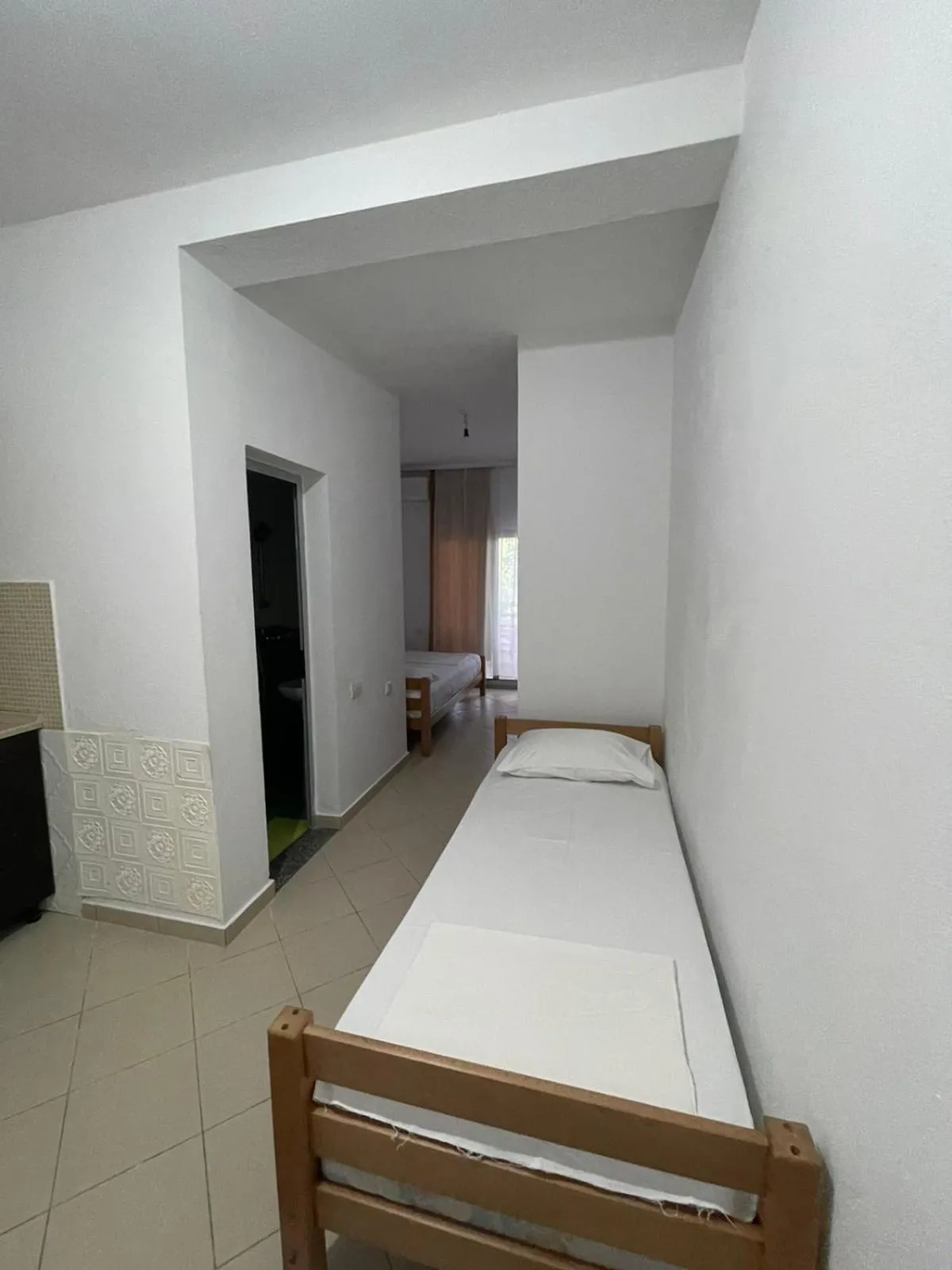 Bed in Aparthotel Vila Tufi