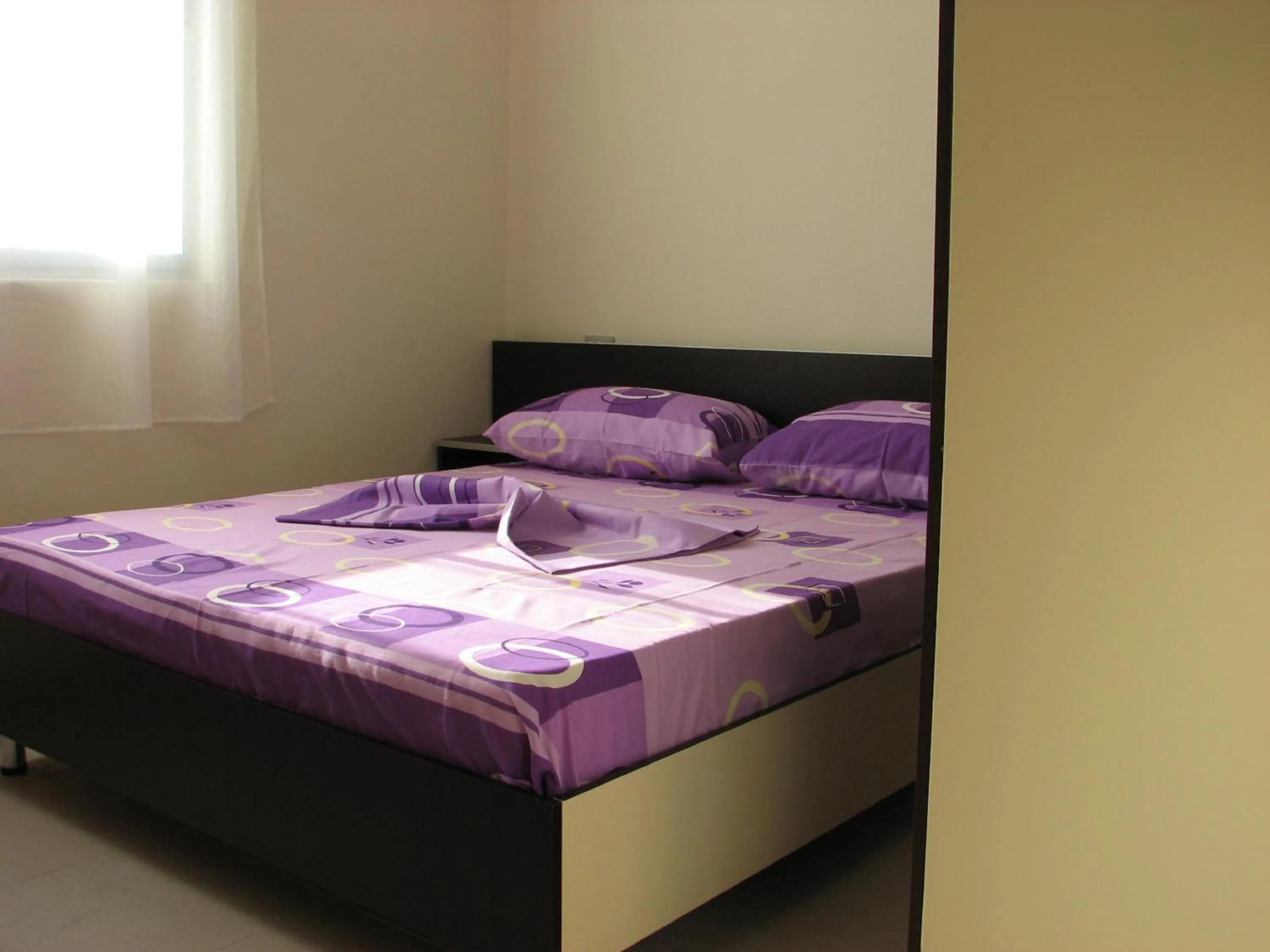 Bed in Aparthotel Vila Tufi
