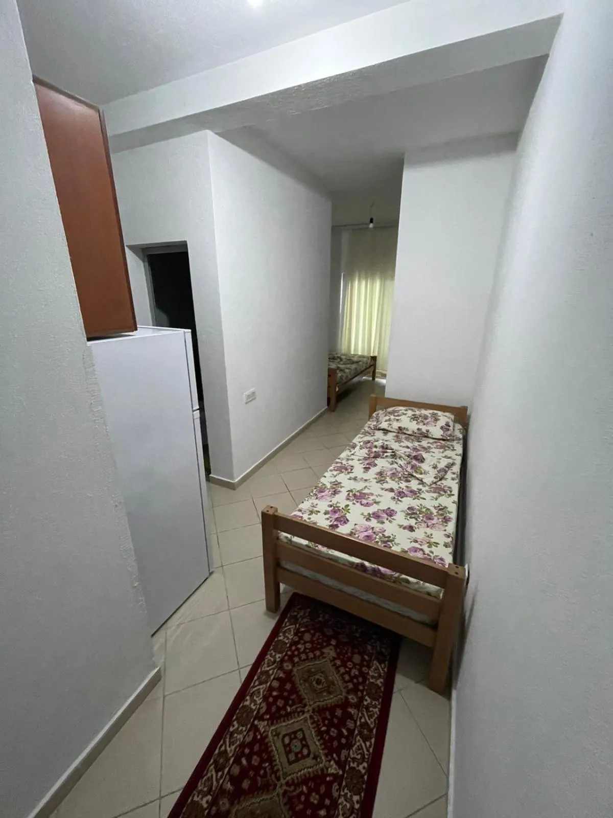 Bed in Aparthotel Vila Tufi