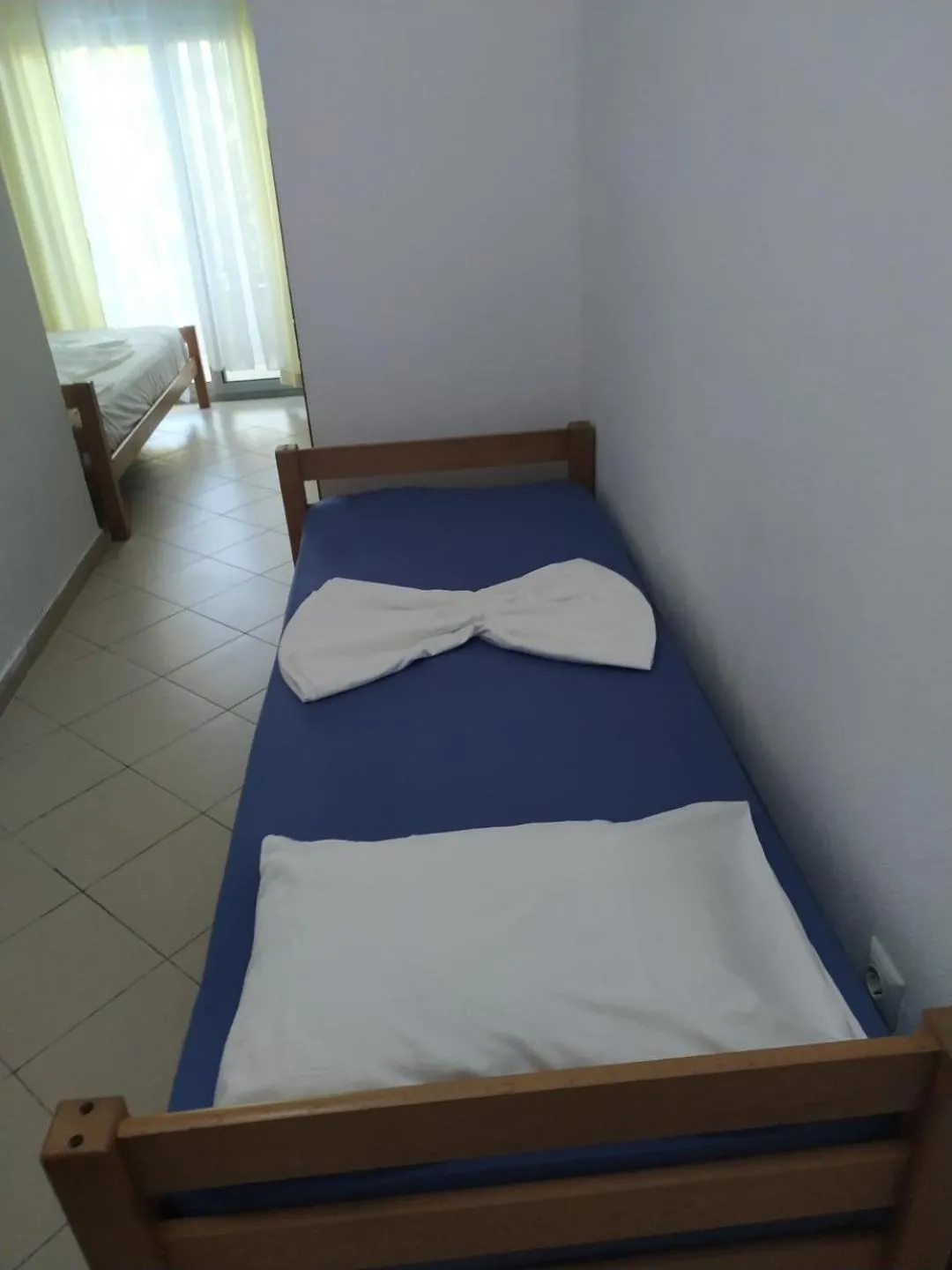 Bed in Aparthotel Vila Tufi