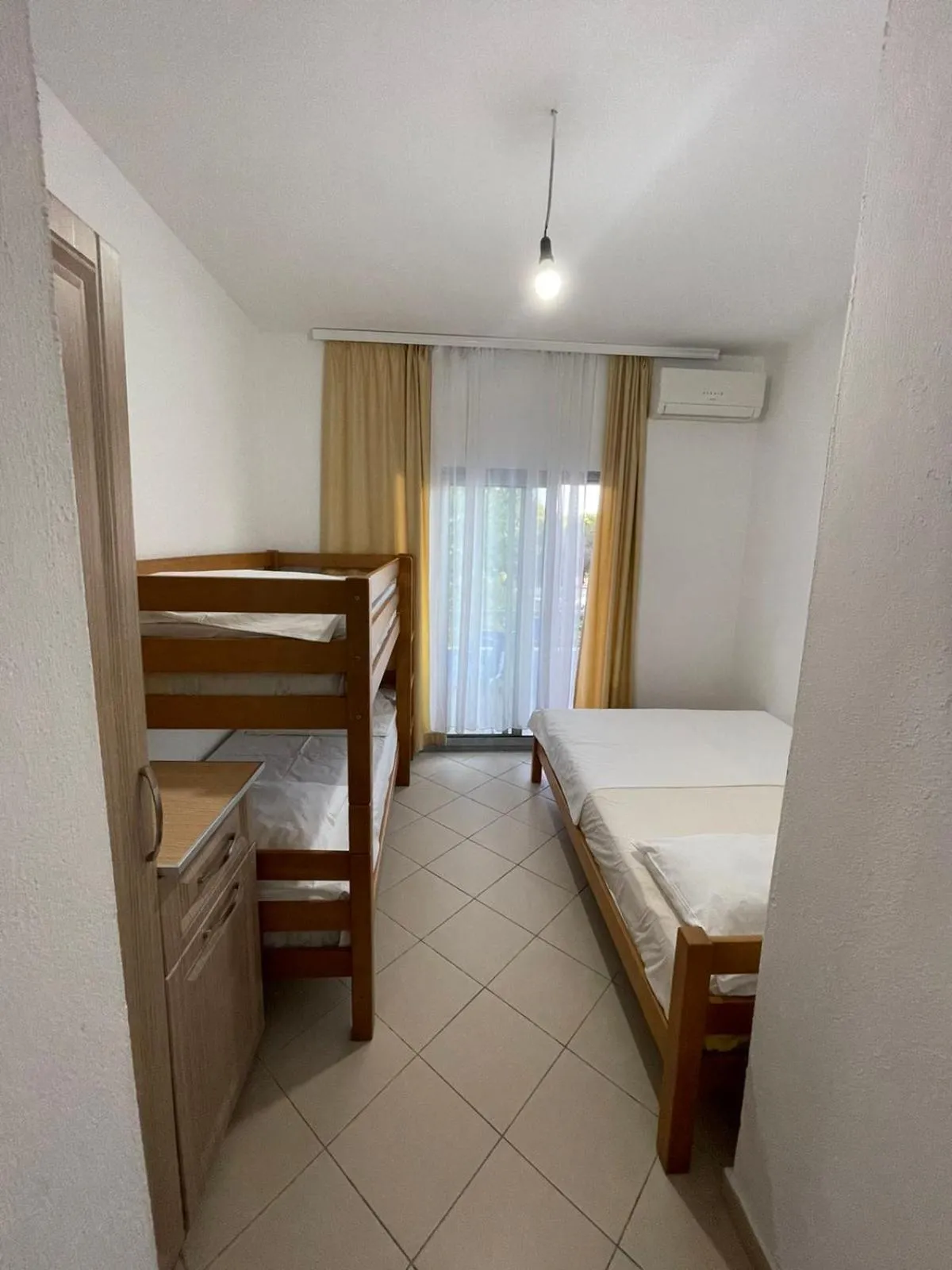 Bed in Aparthotel Vila Tufi