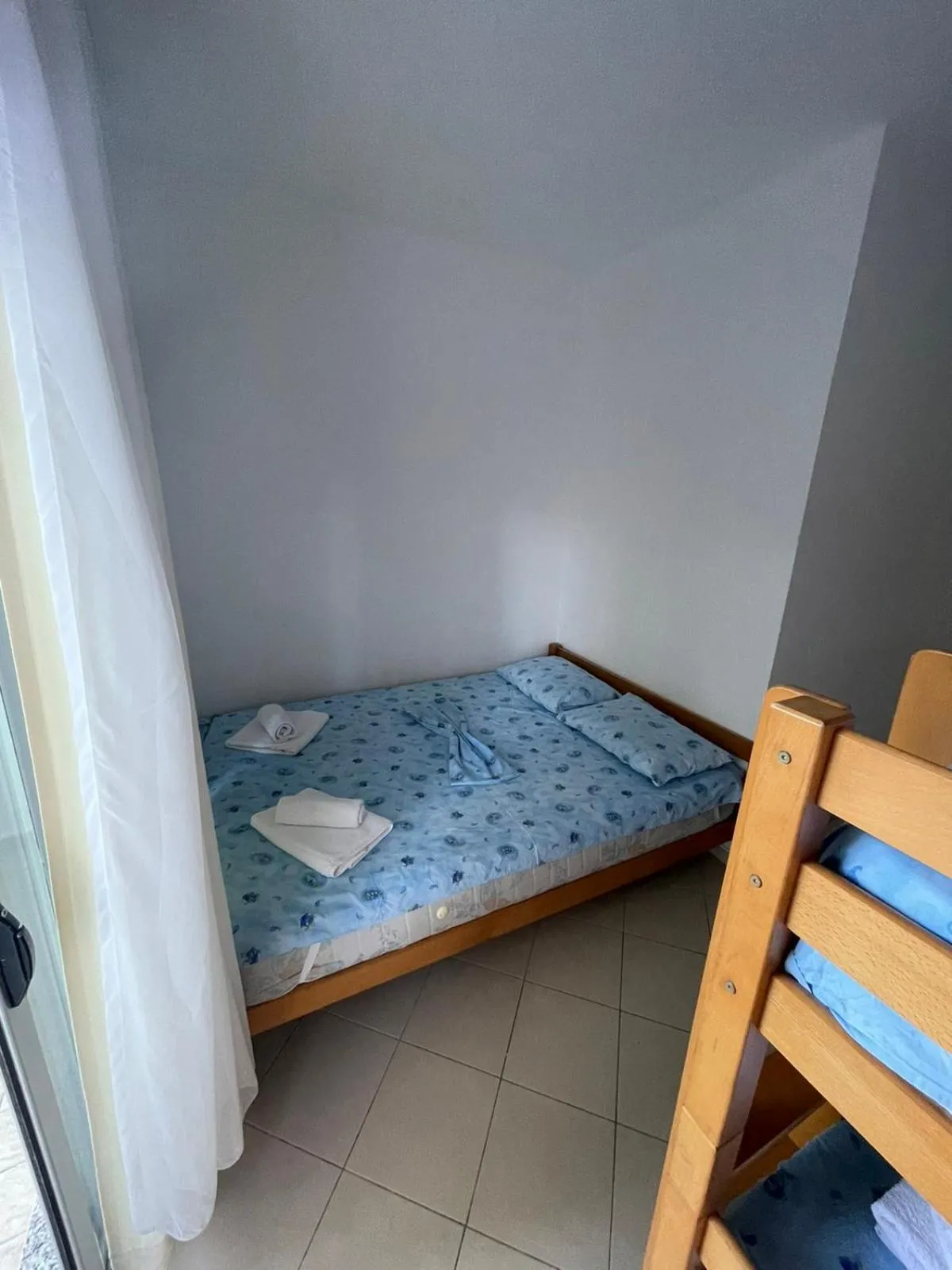 Bed in Aparthotel Vila Tufi