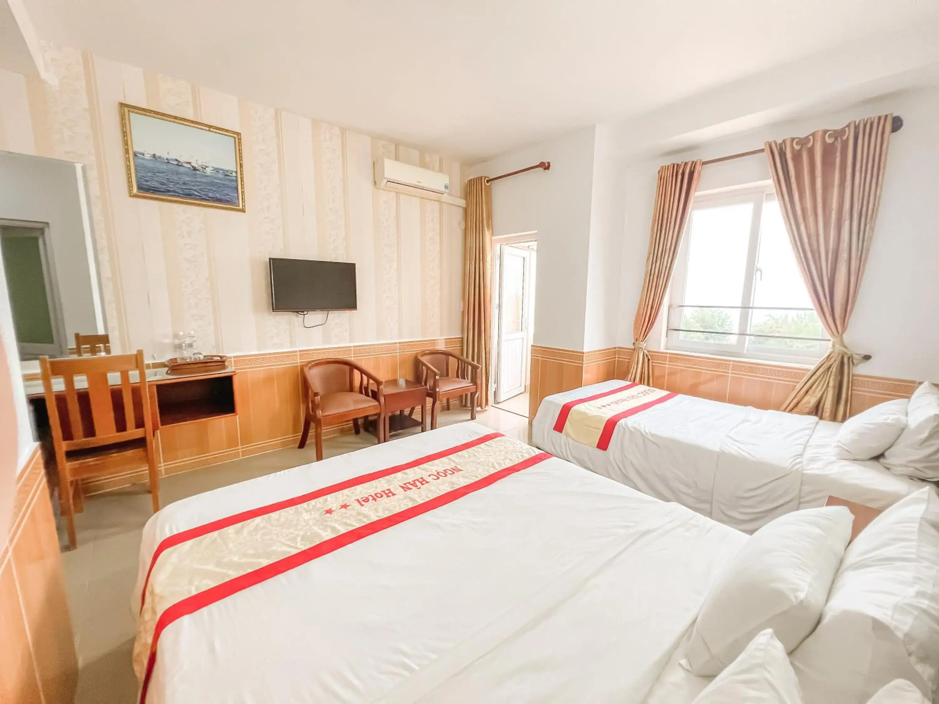 Triple Room with Balcony in Ngọc Hân Hotel By The Moment Triple Room with Balcony in Ngọc Hân Hotel By The Moment