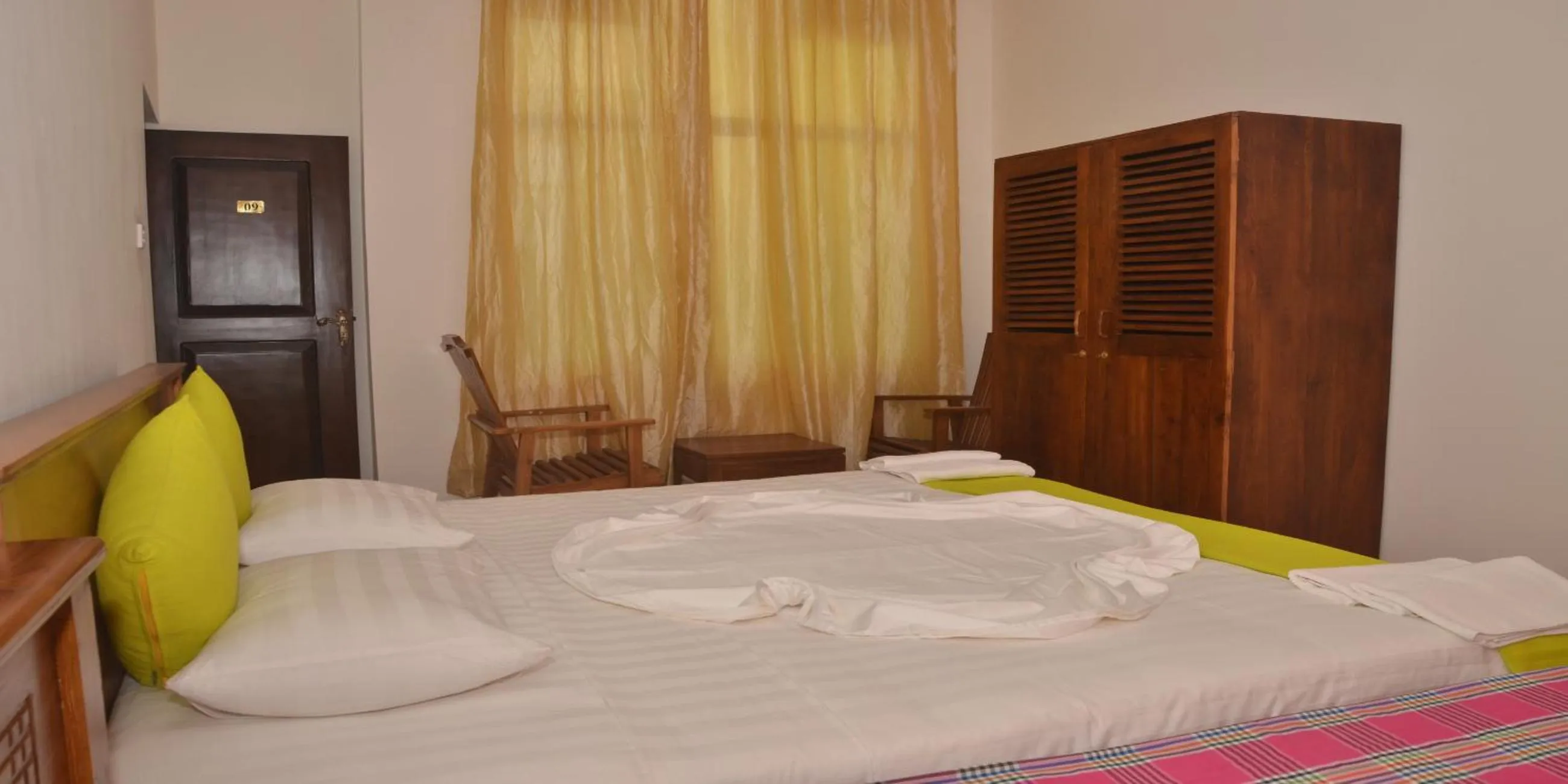 Photo of the whole room, Bed in Auslink Hotel