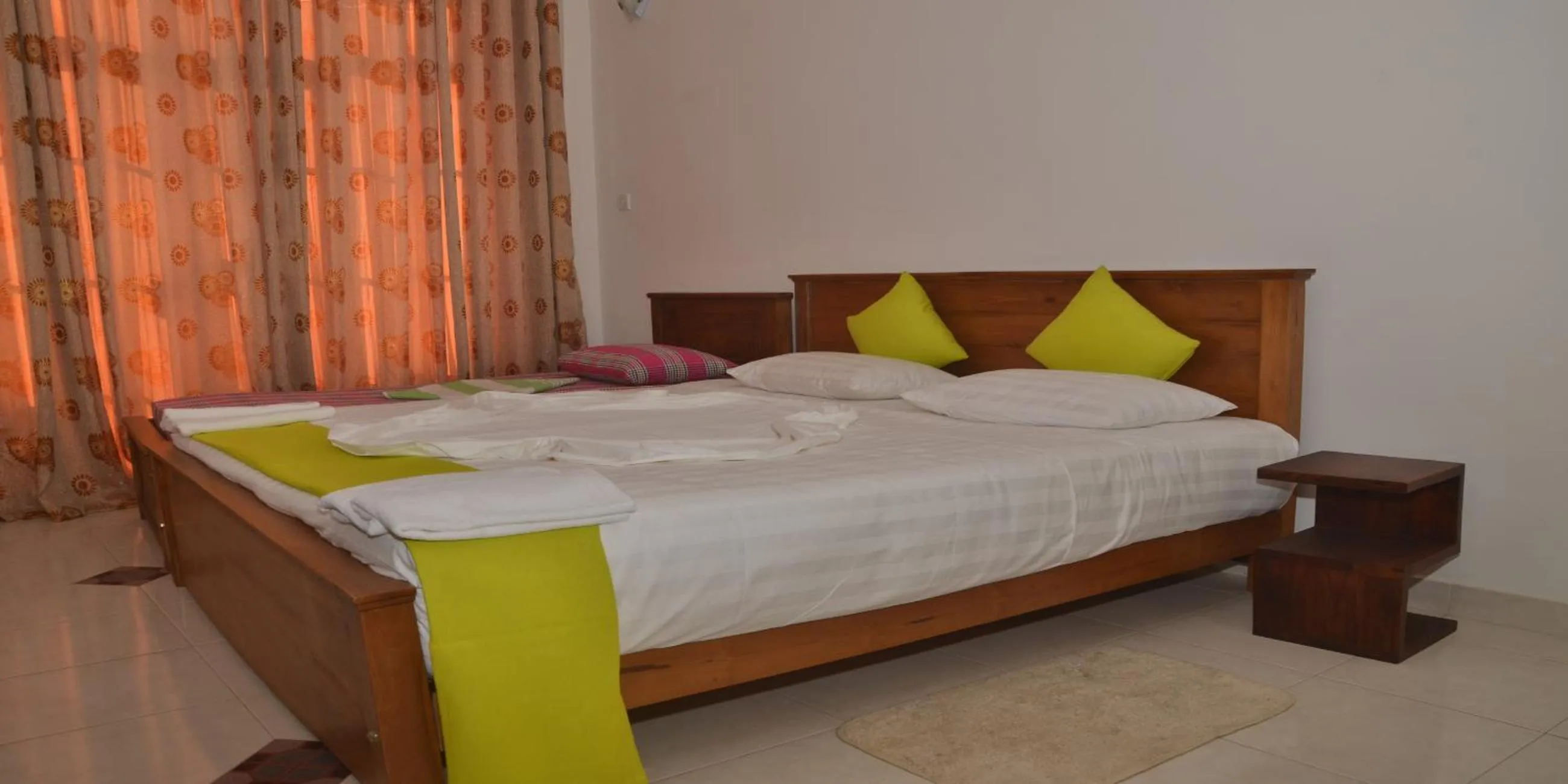 Bed in Auslink Hotel