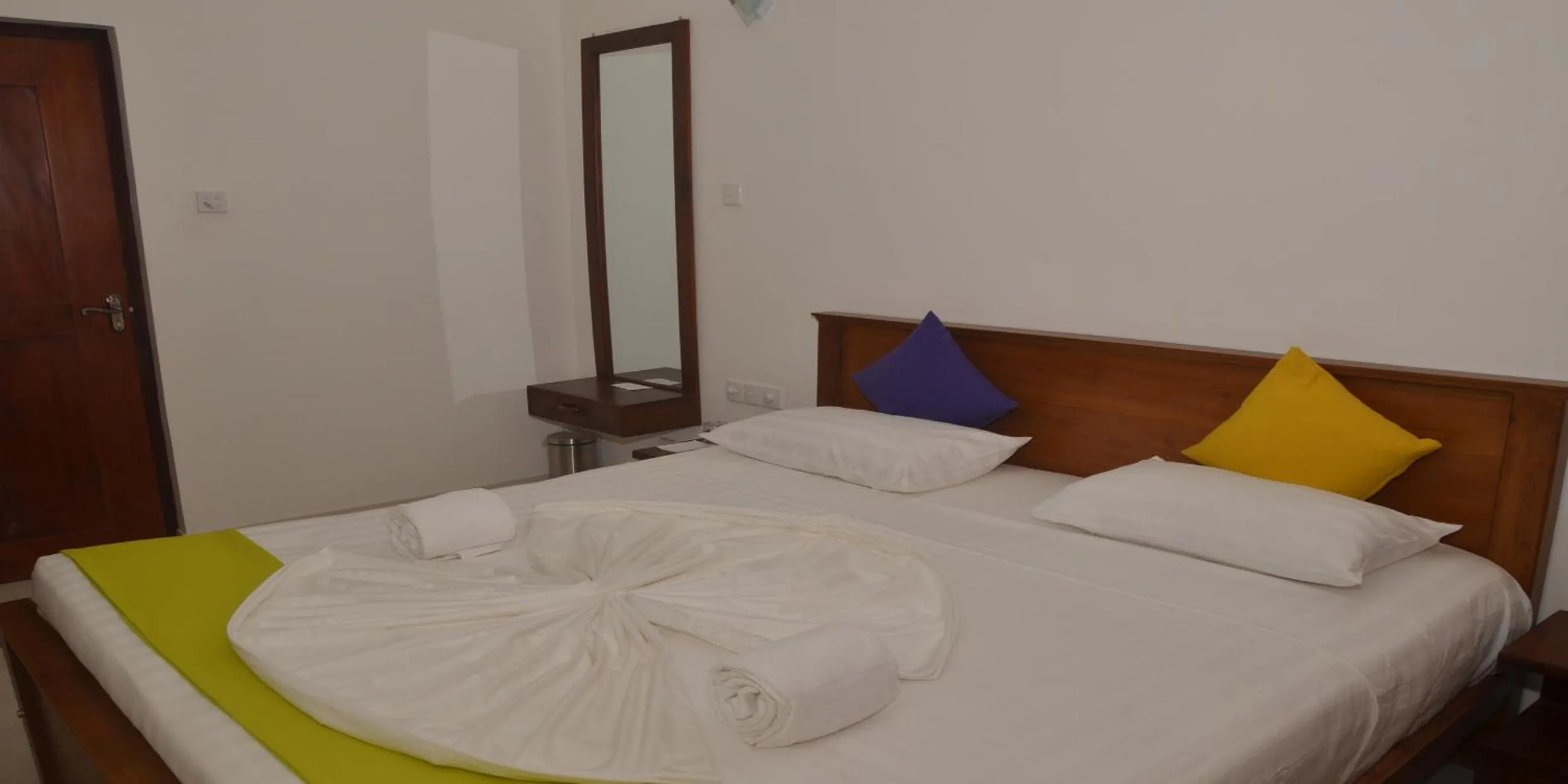 Bed in Auslink Hotel