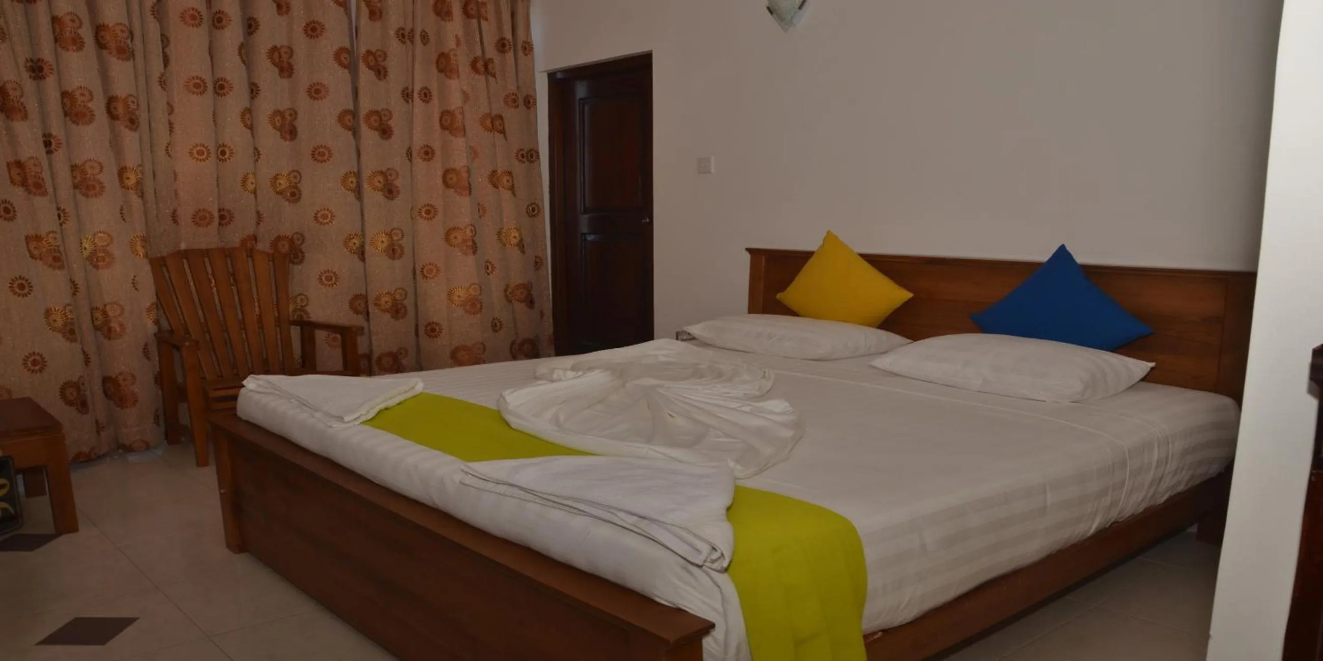 Bed in Auslink Hotel