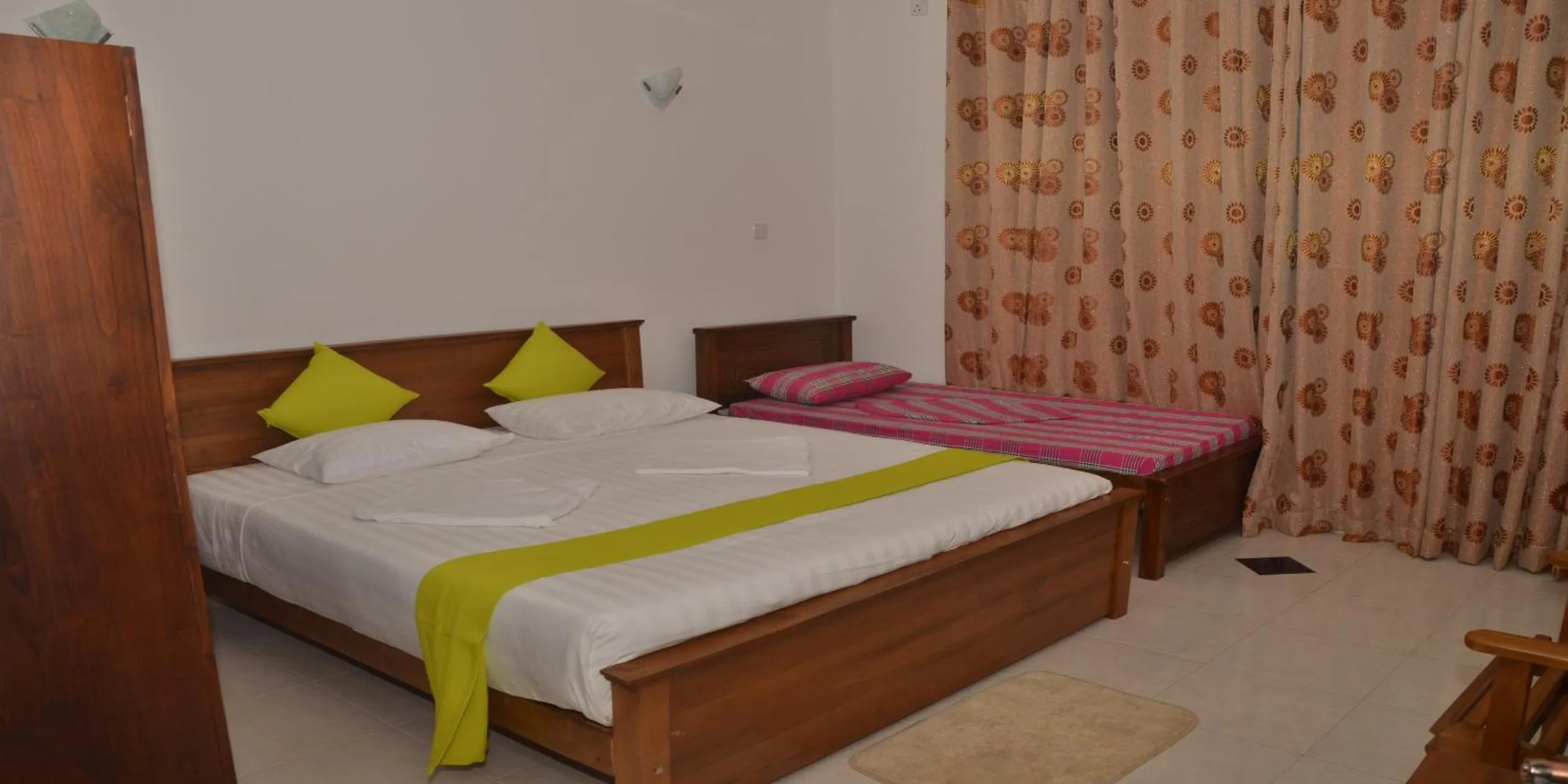 Bed in Auslink Hotel