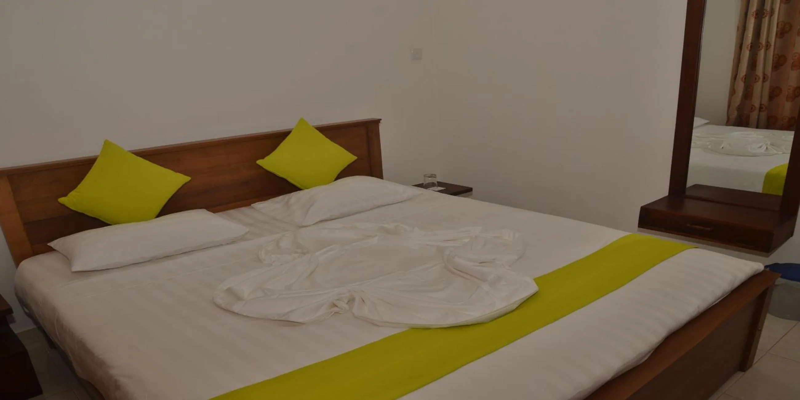 Bed in Auslink Hotel