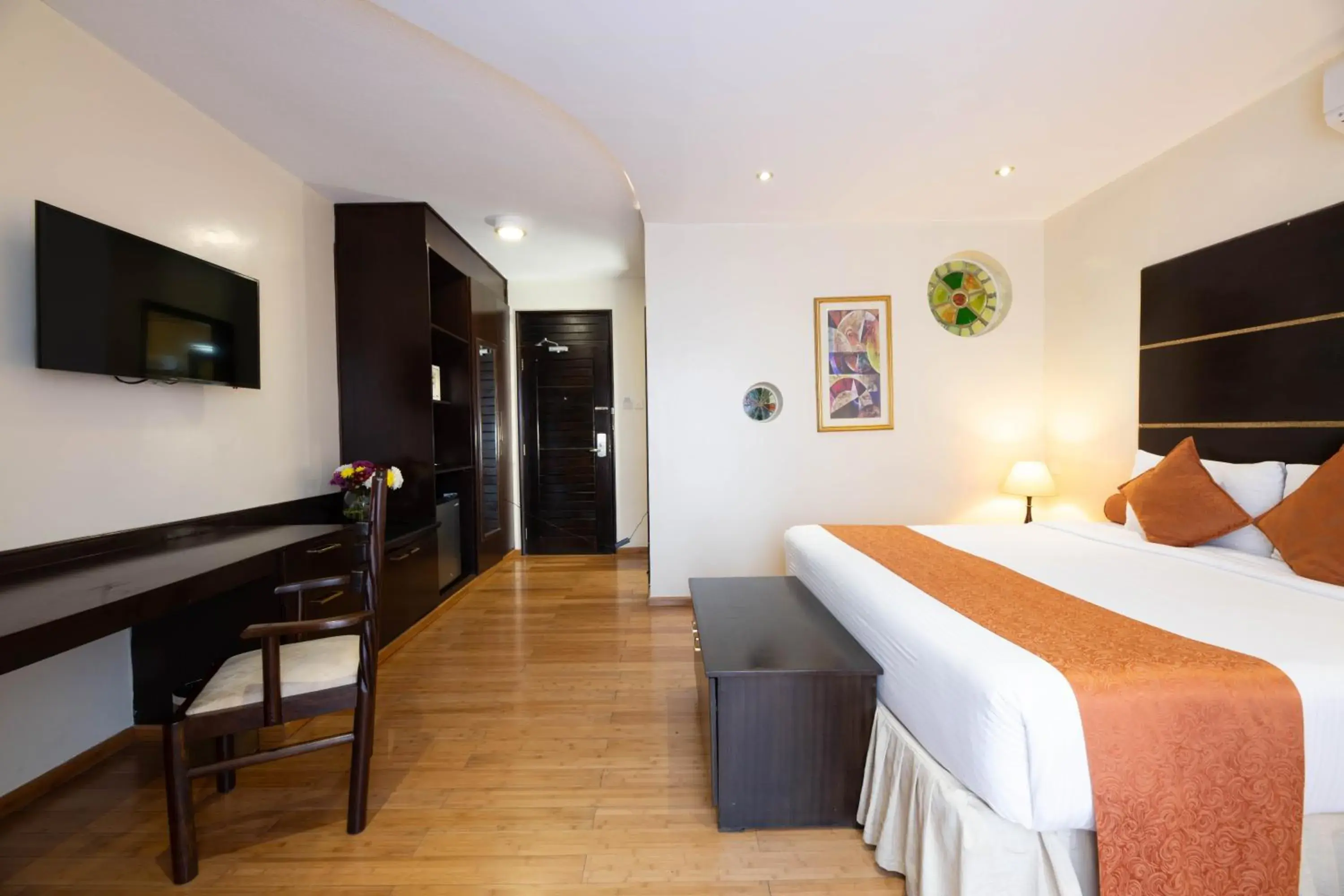 Bed in The Monarch Hotel Bed in The Monarch Hotel