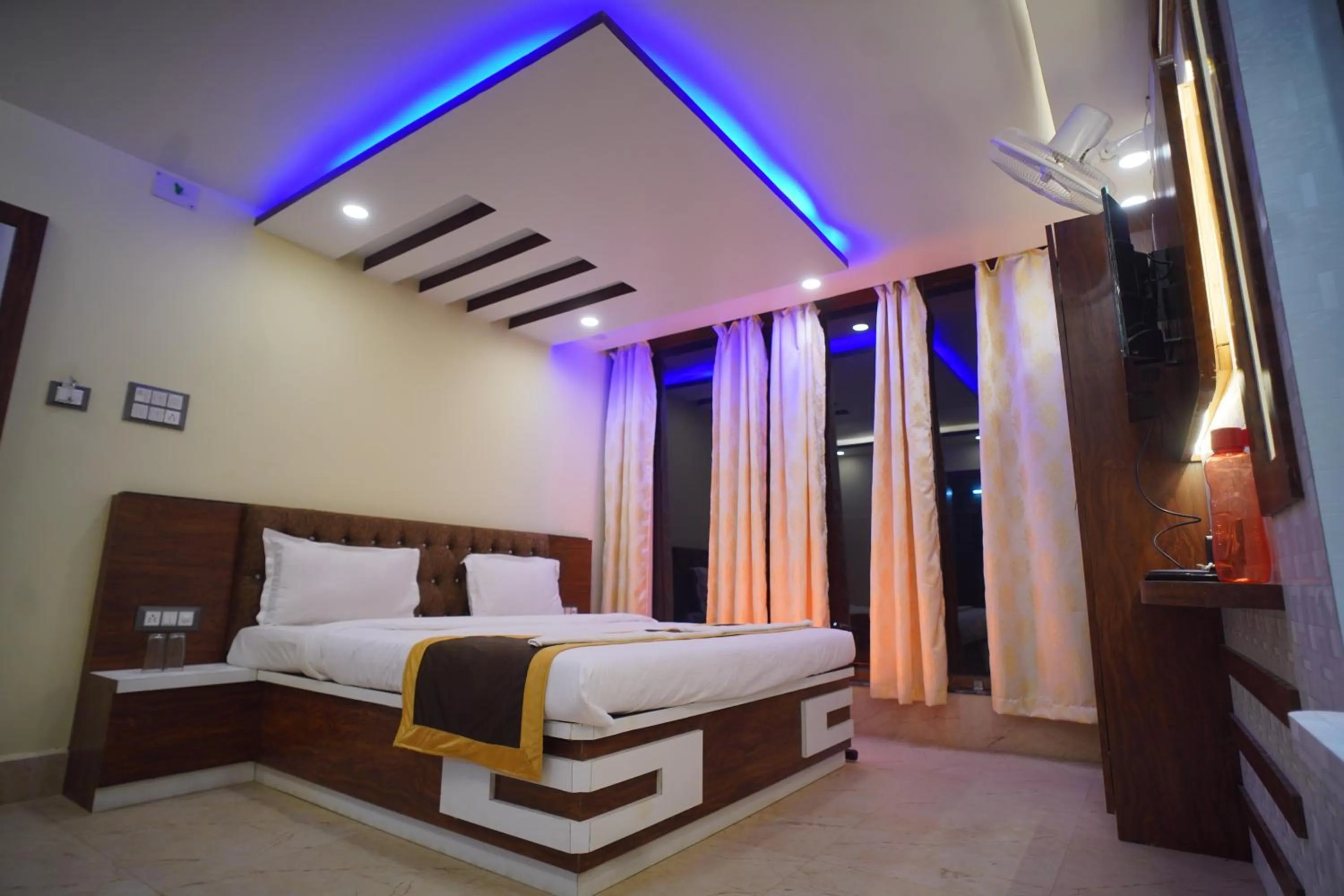 Bedroom in Hotel Asha Inn