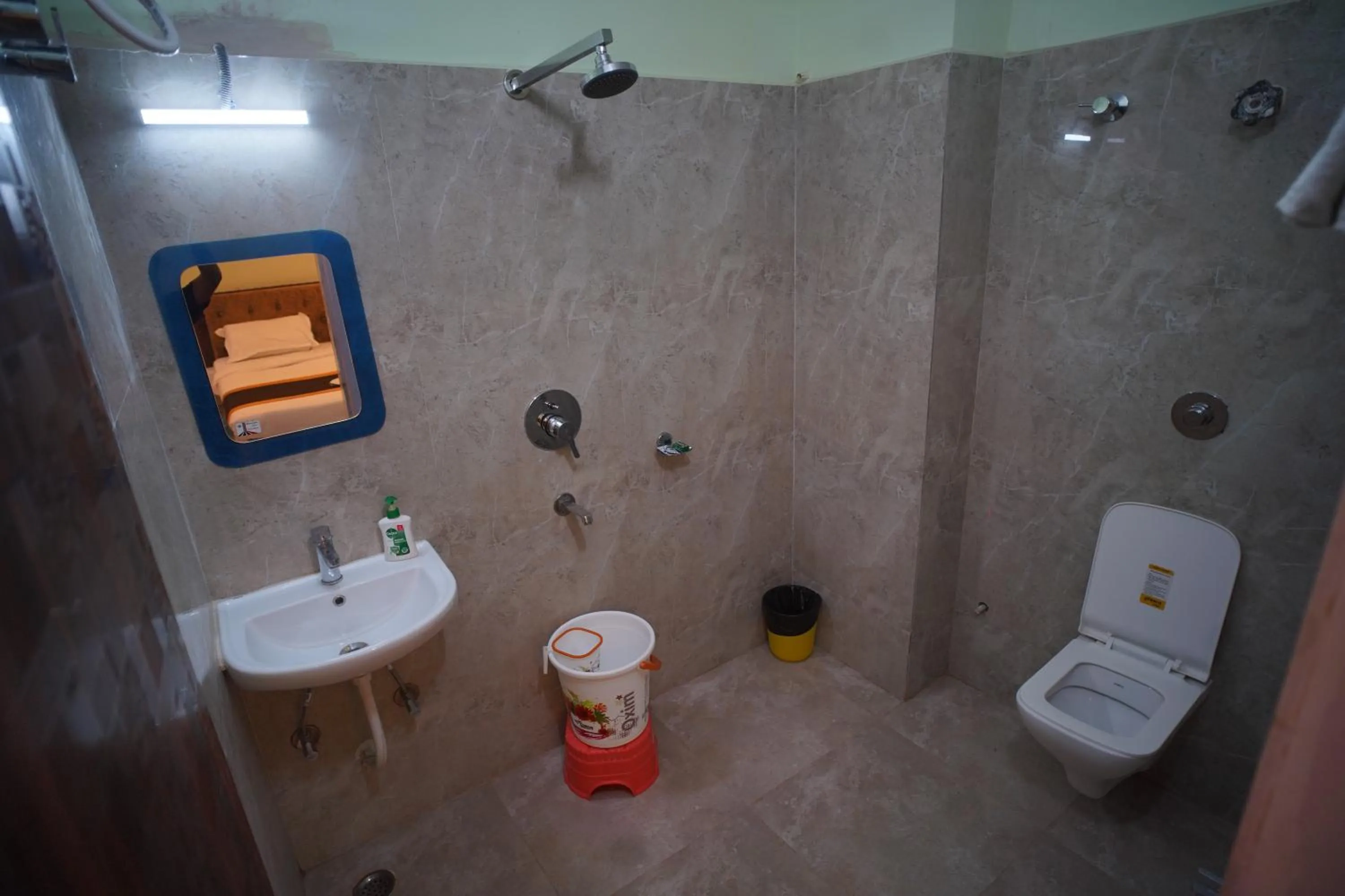 Shower in Hotel Asha Inn