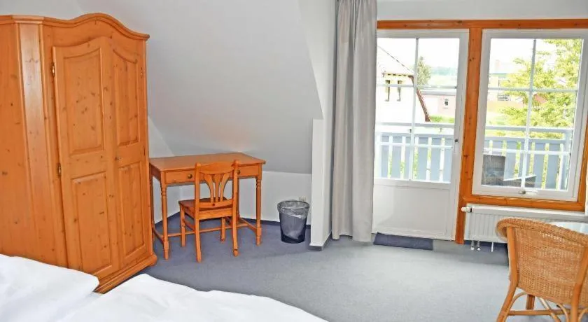 Bedroom, Bed in Hotel InselGlück - Restaurant & Cafè