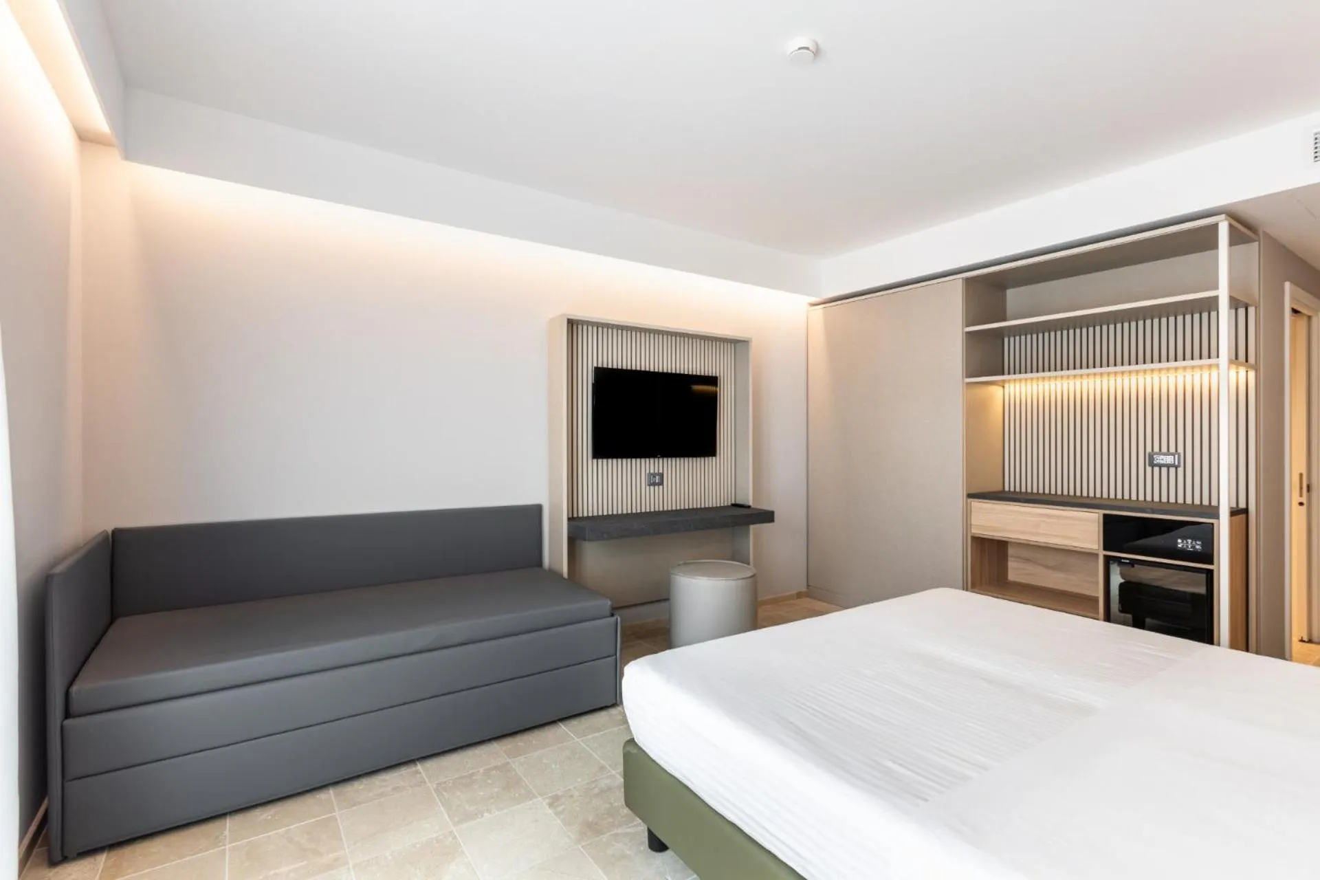 Bed in Hotel Netum Mare