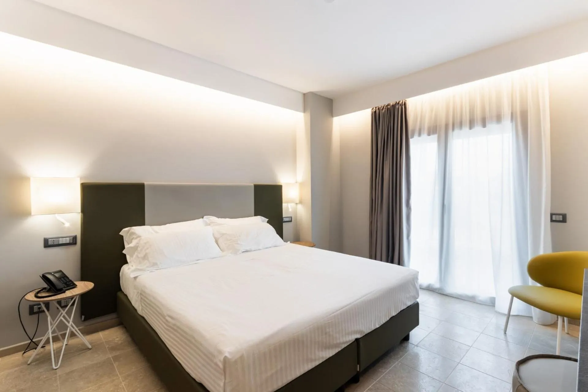 Bed in Hotel Netum Mare