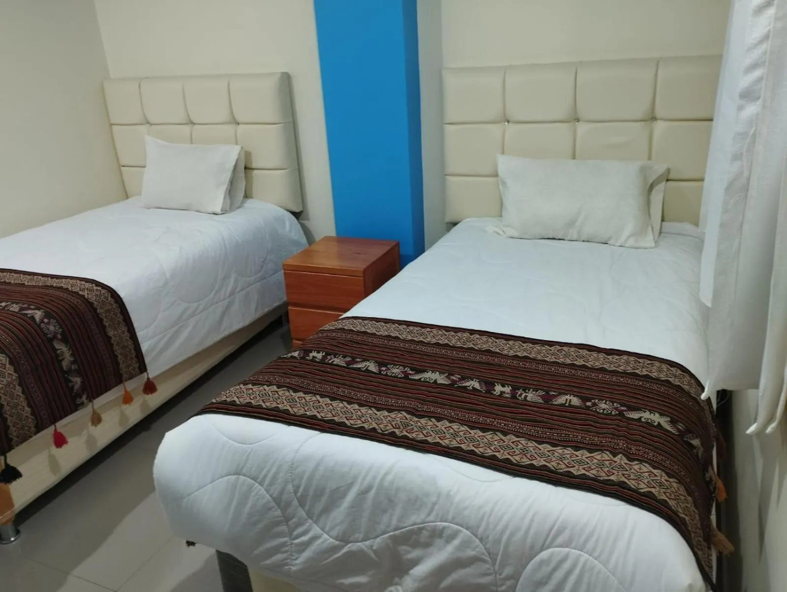 Bed in hotel plaza chinchero