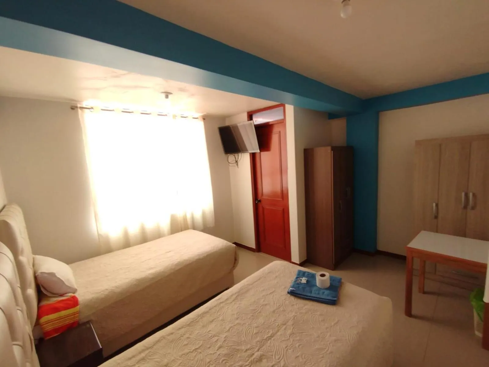 Bed in hotel plaza chinchero