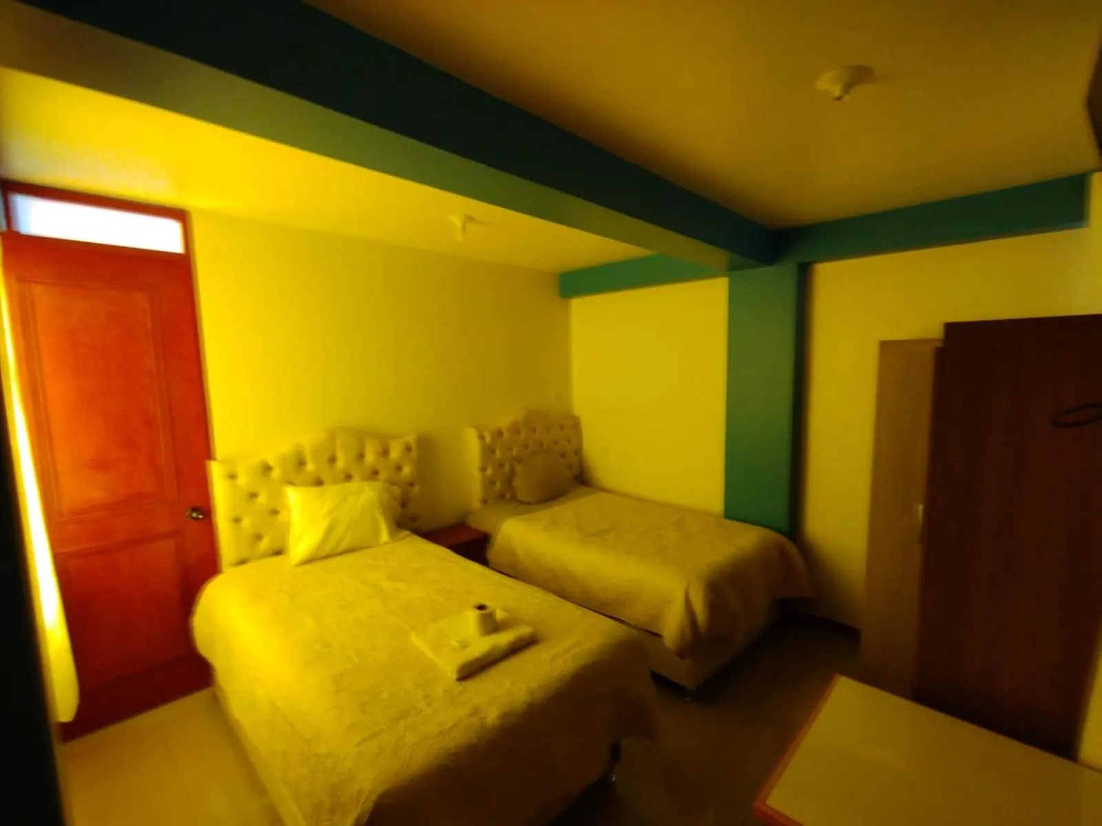 Bed in hotel plaza chinchero