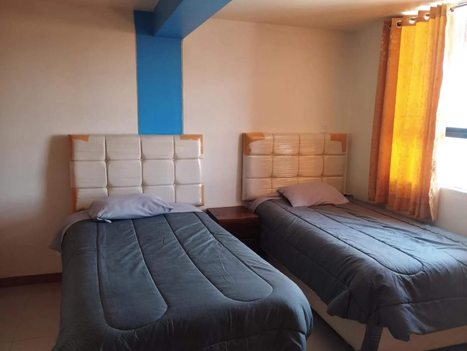 Bed in hotel plaza chinchero