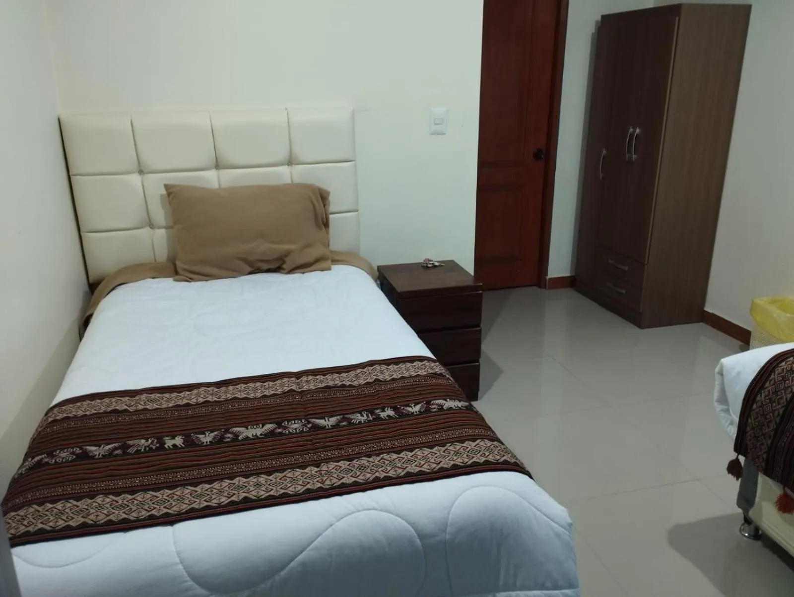 Bed in hotel plaza chinchero