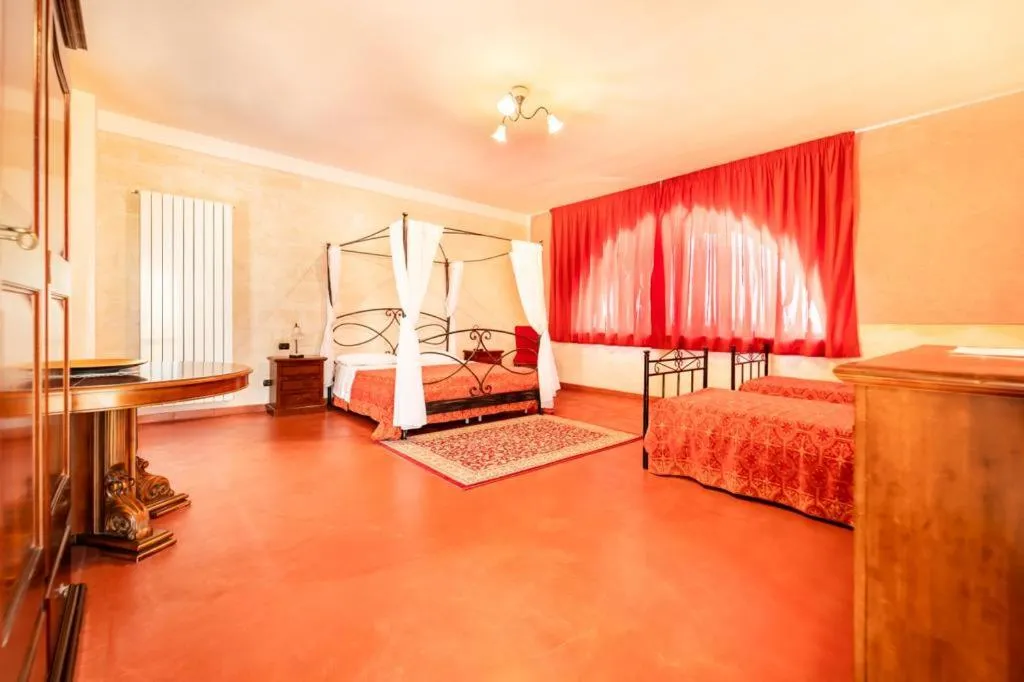Deluxe Quadruple Room in B&B Villa Flora