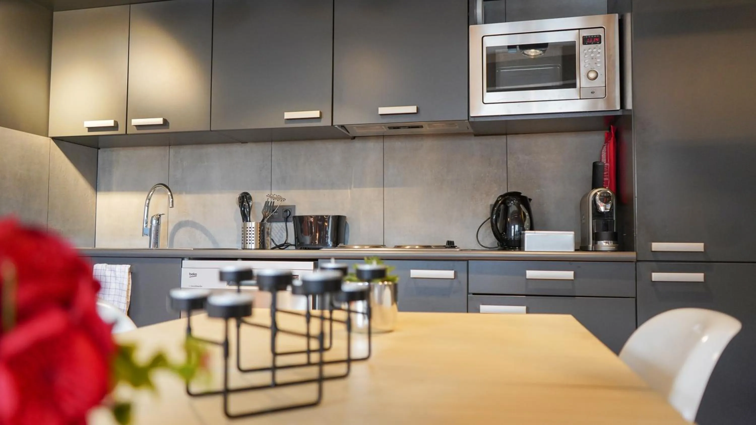 Kitchen or kitchenette in Amosa Liège City Centre Hotel