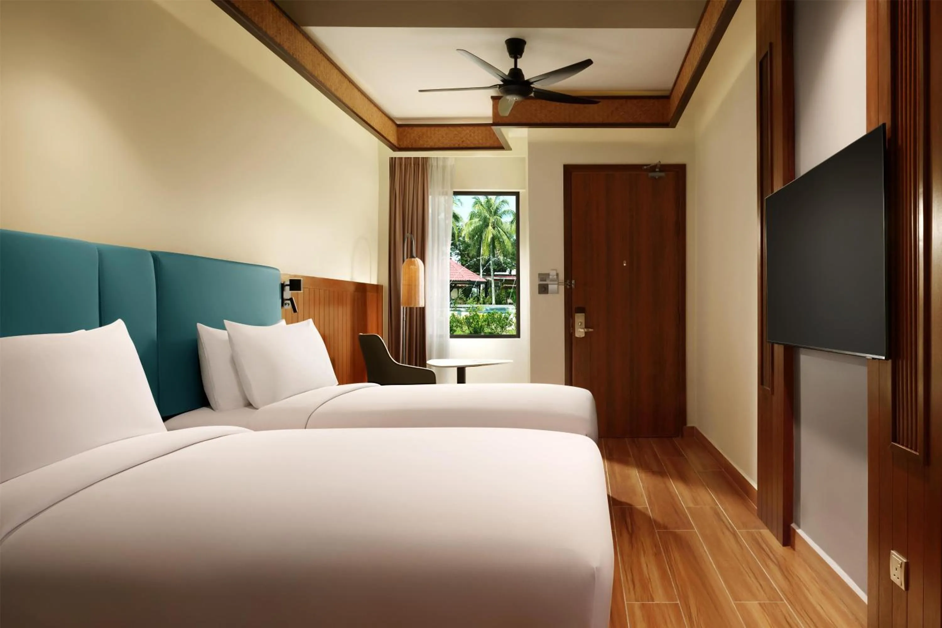 Photo of the whole room, Bed in Hilton Garden Inn Kota Kinabalu Tuaran