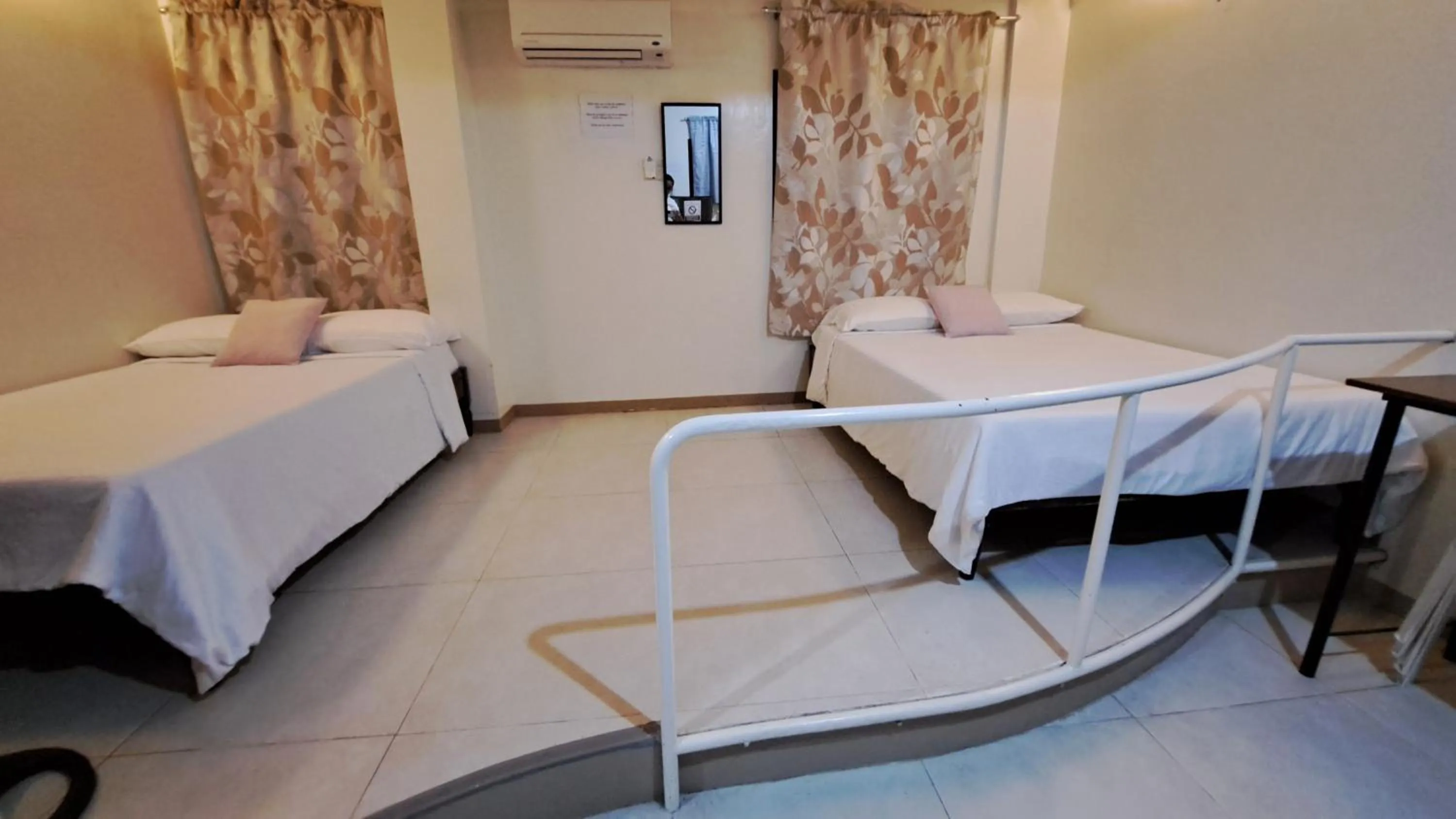 Bed in Villa Pamana Inn Puerto Galera powered by Cocotel