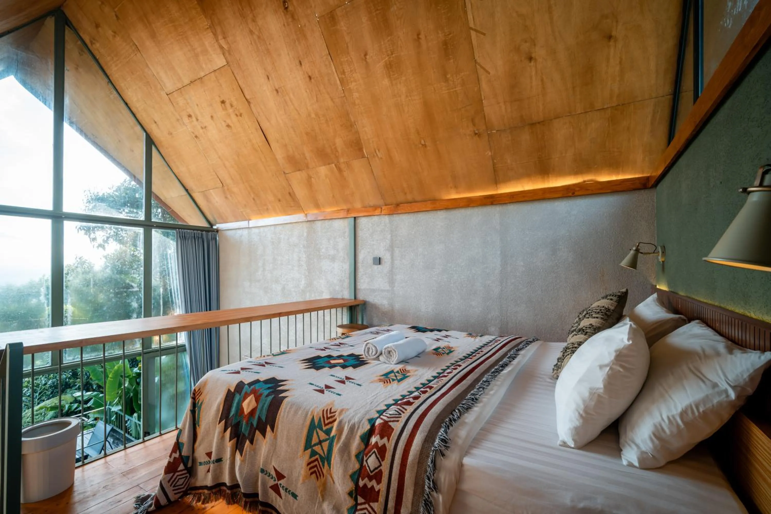 Photo of the whole room, Bed in Black Wood Cabin