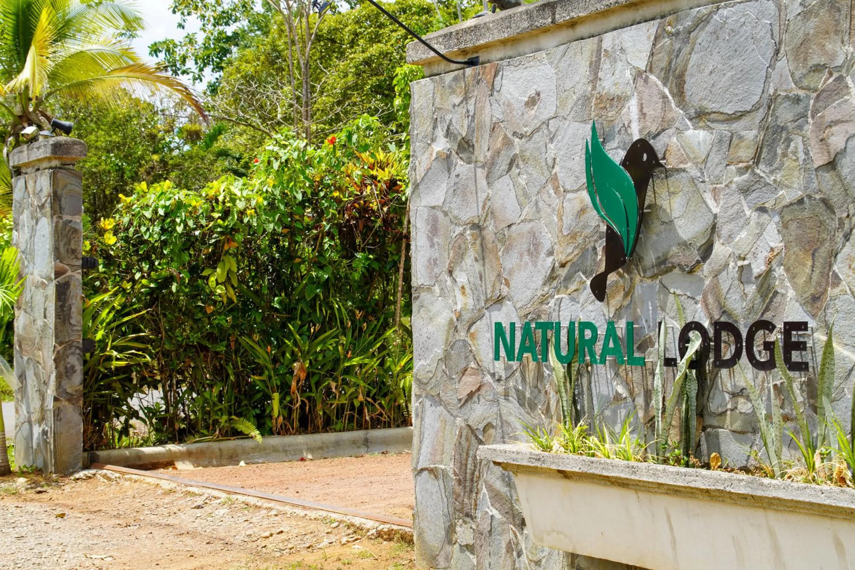 Property logo or sign in Natural Lodge Caño Negro