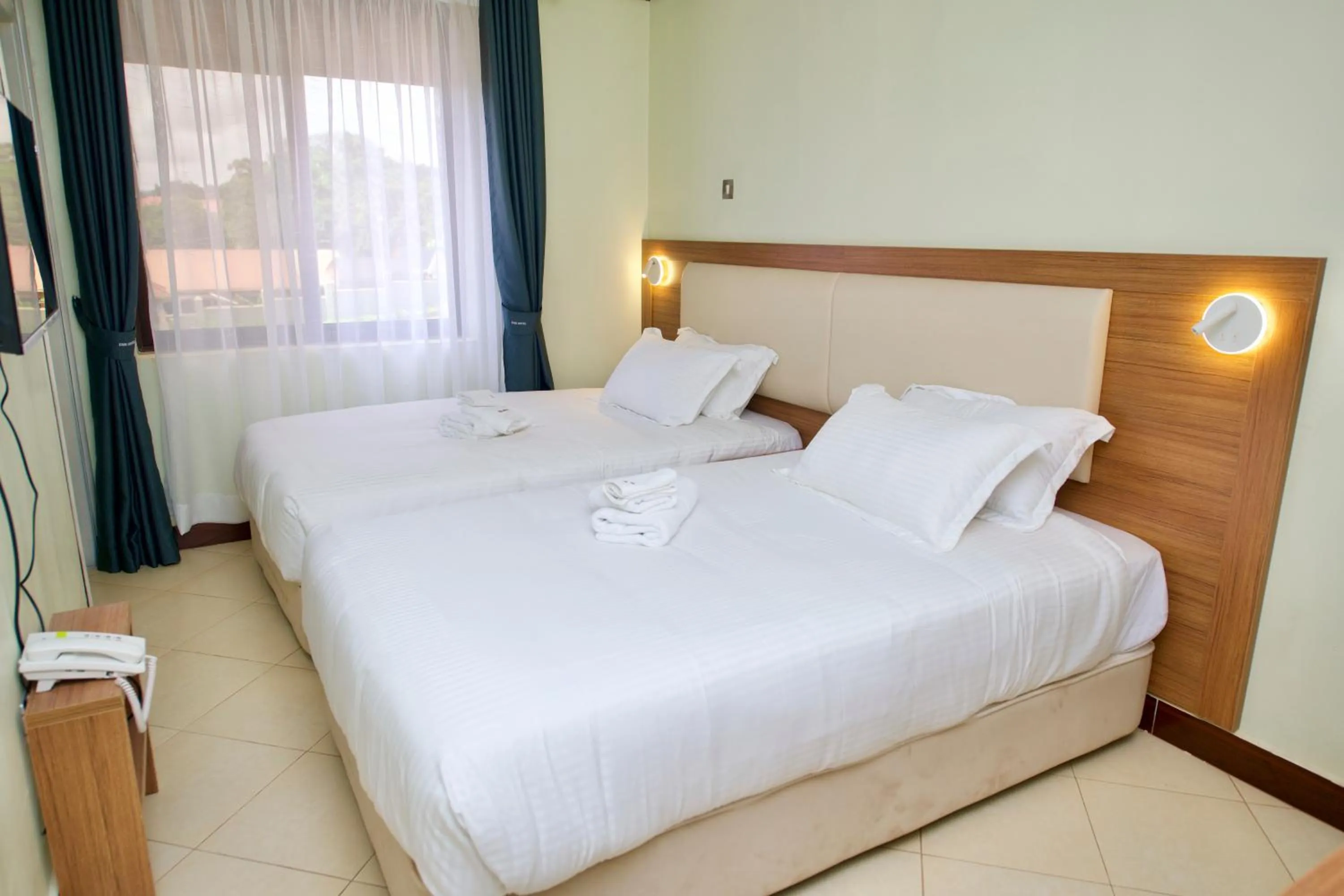 Bed in ENN Business Hotel