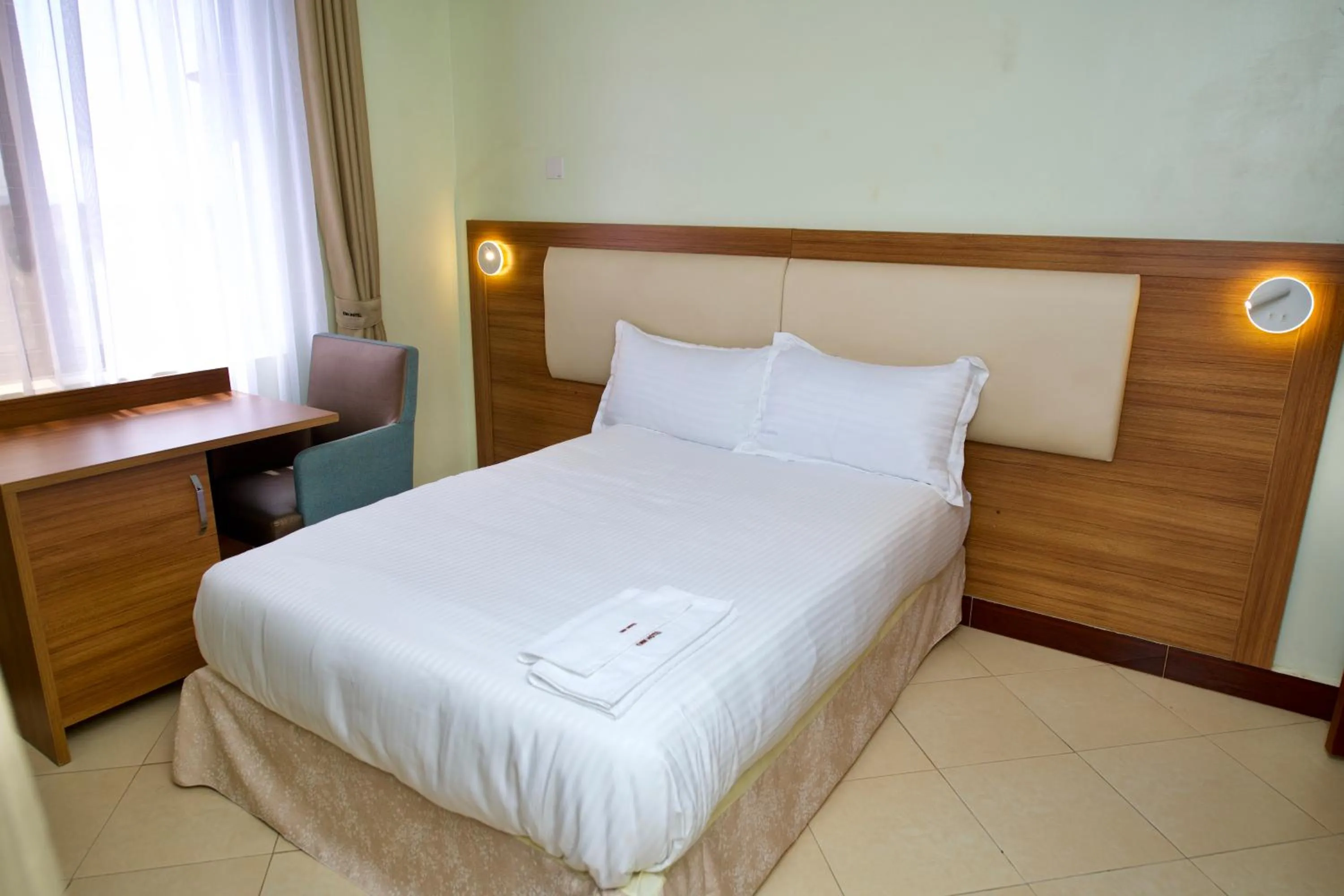 Bedroom, Bed in ENN Business Hotel