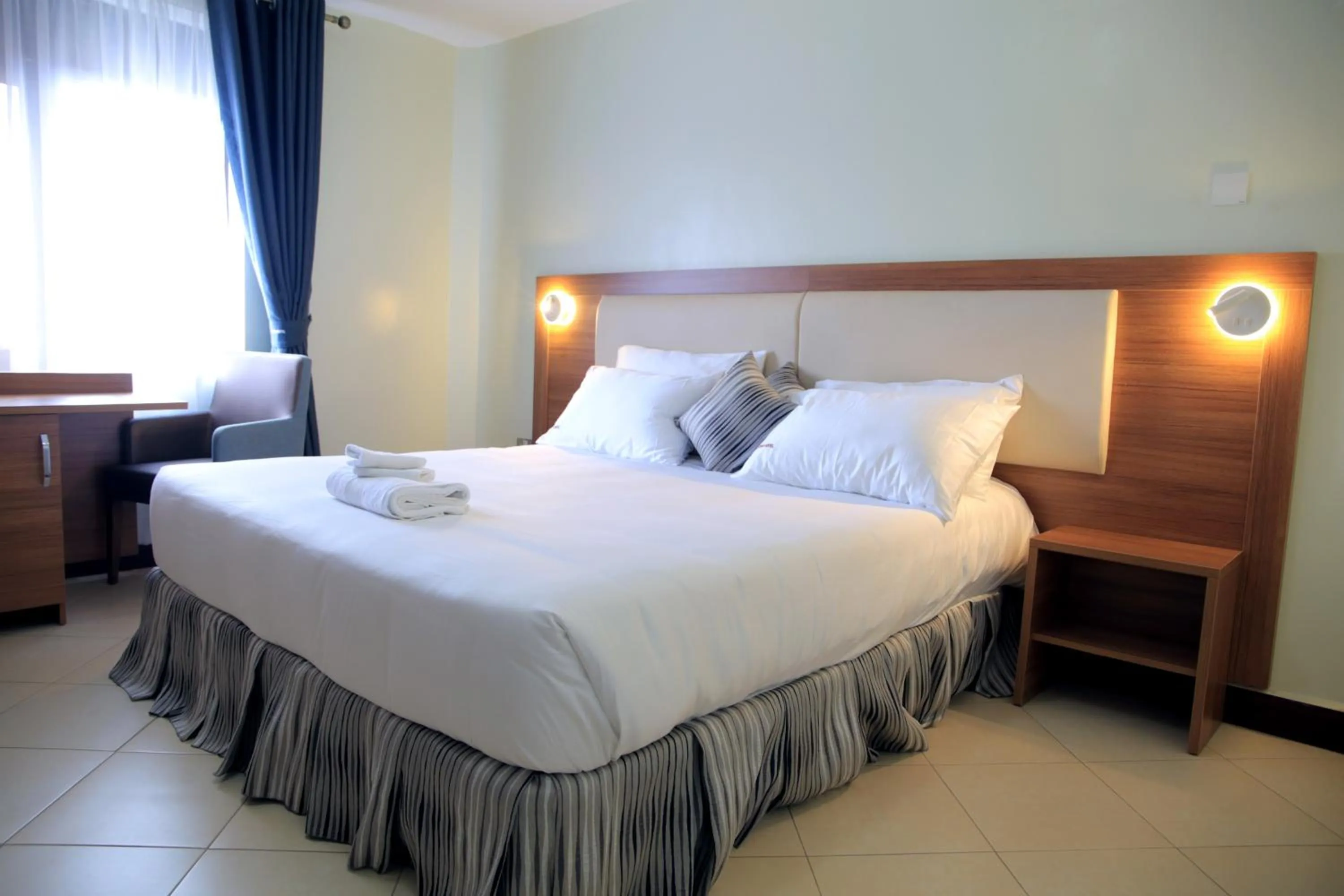 Bed in ENN Business Hotel