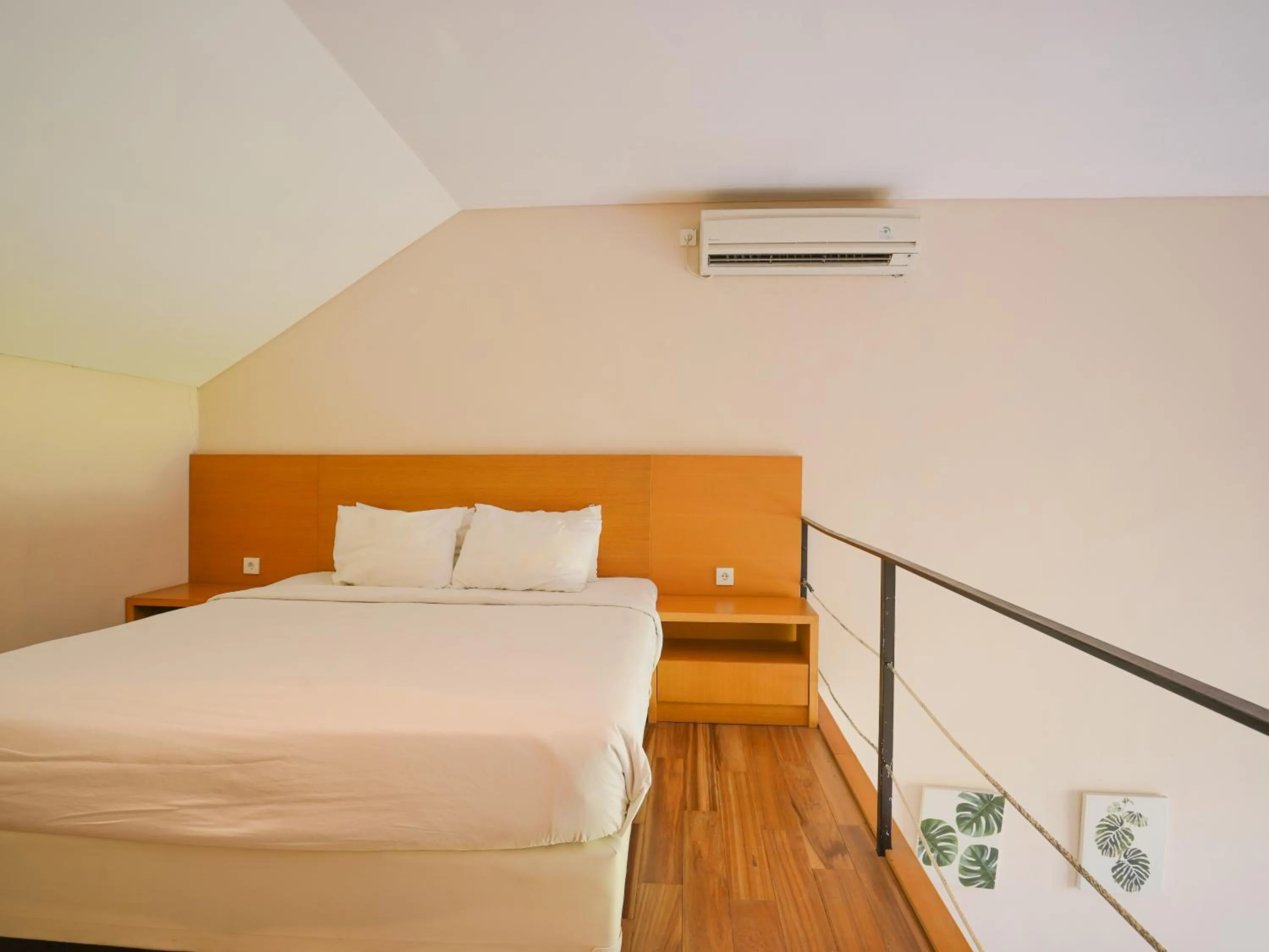 Bed in Sunrise Suite Seminyak by ARM Hospitality