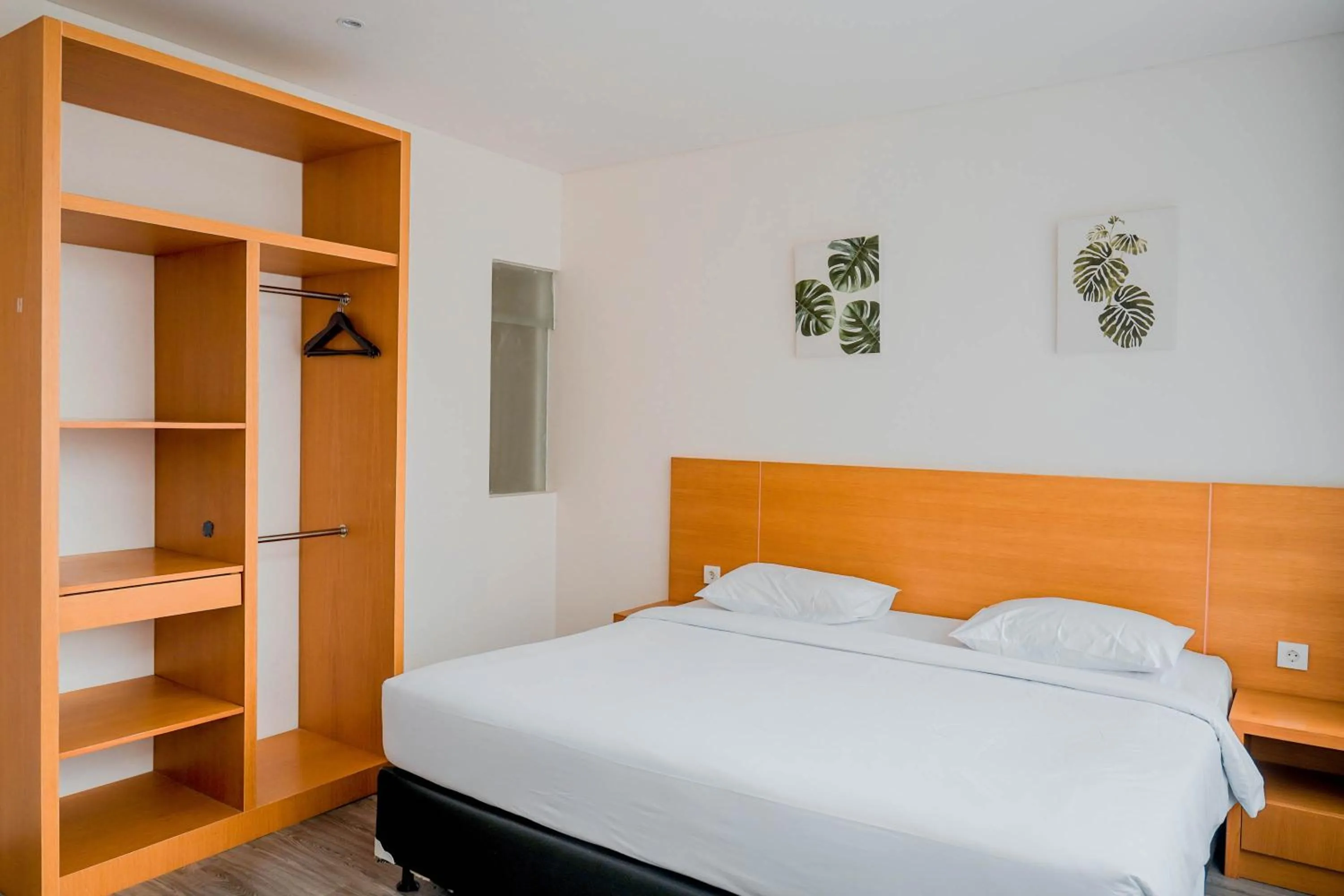 Bed in Sunrise Suite Seminyak by ARM Hospitality