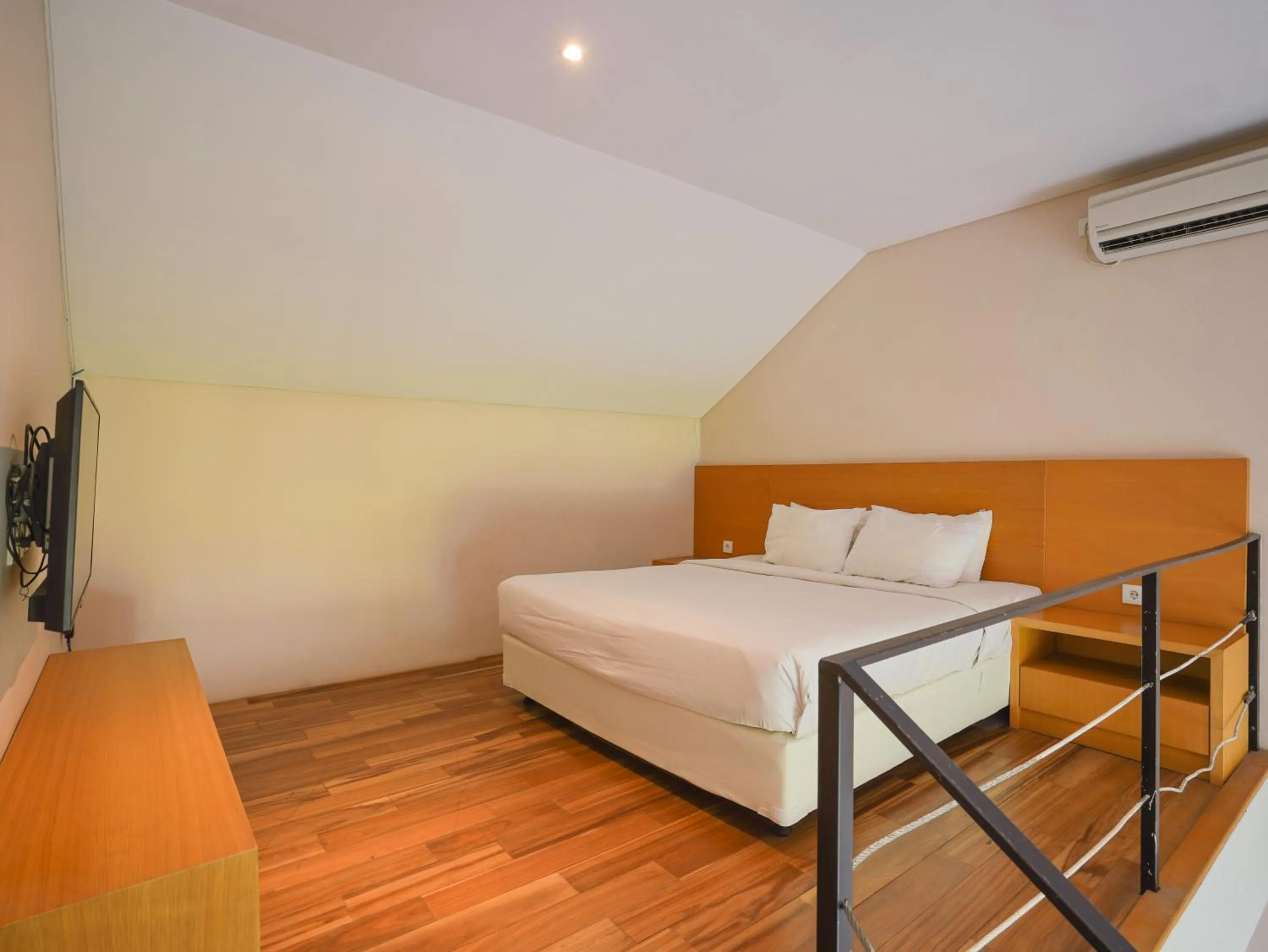 Communal lounge/ TV room, Bed in Sunrise Suite Seminyak by ARM Hospitality