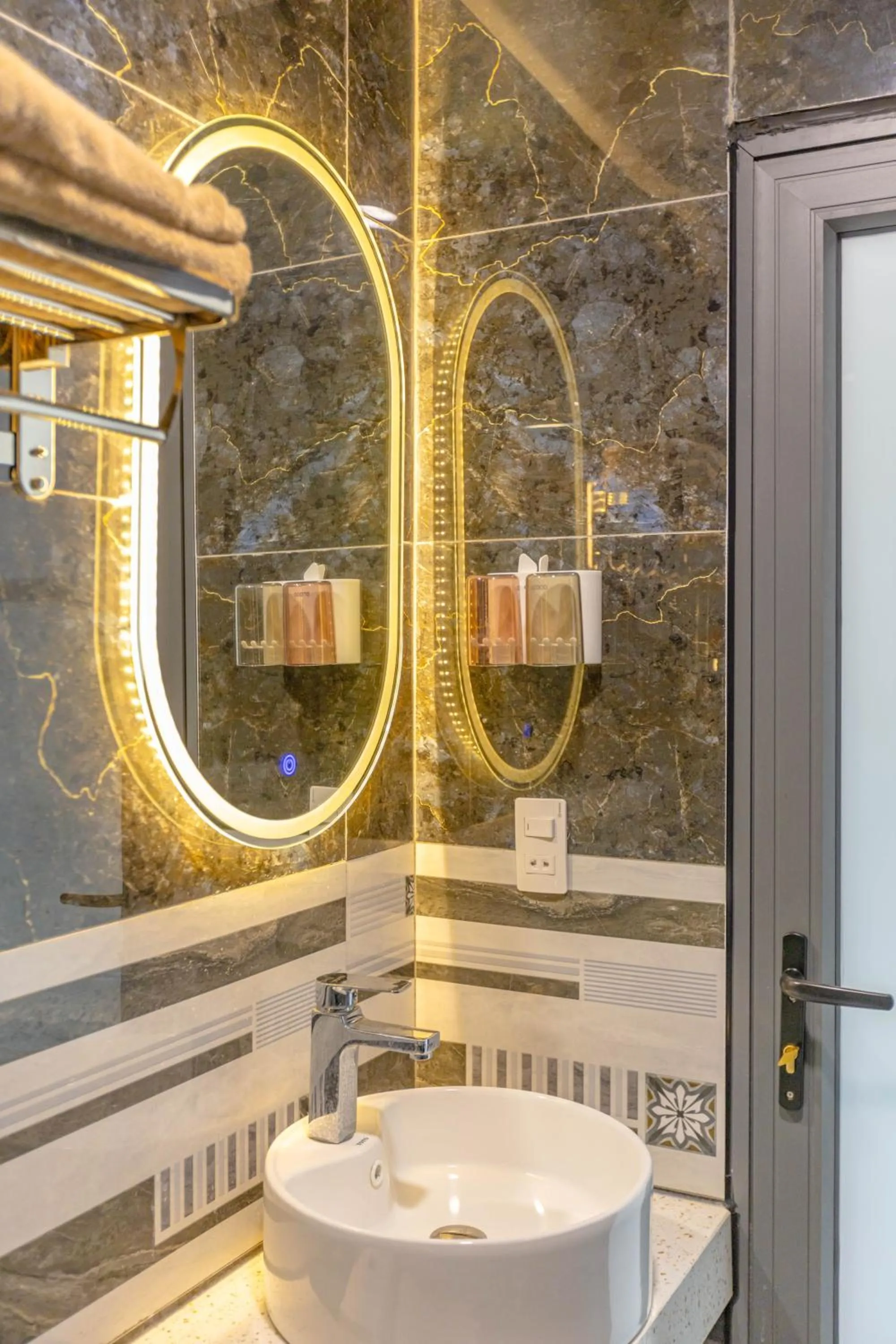 Bathroom in LUMI Hotel & Apartment