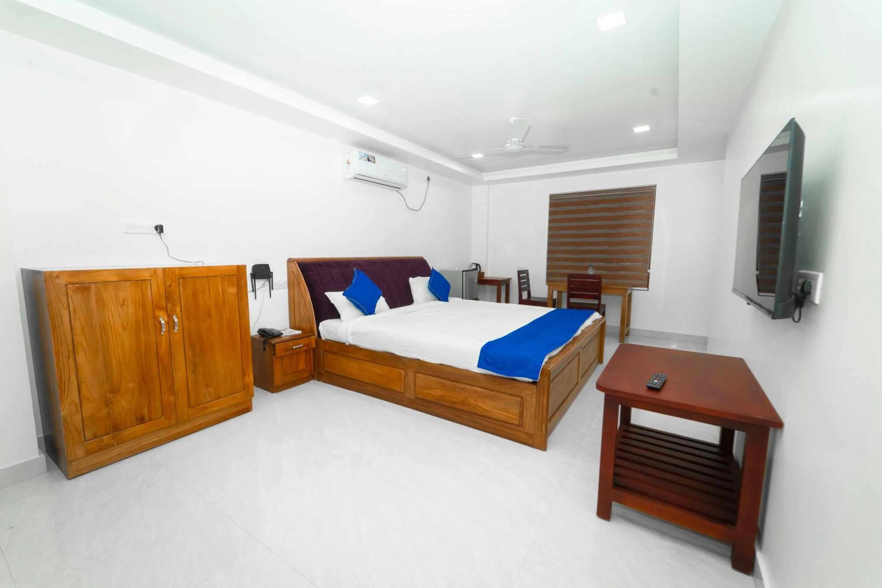 Bed in Skylar Seaview Beach Resort & Ayurveda Varkala