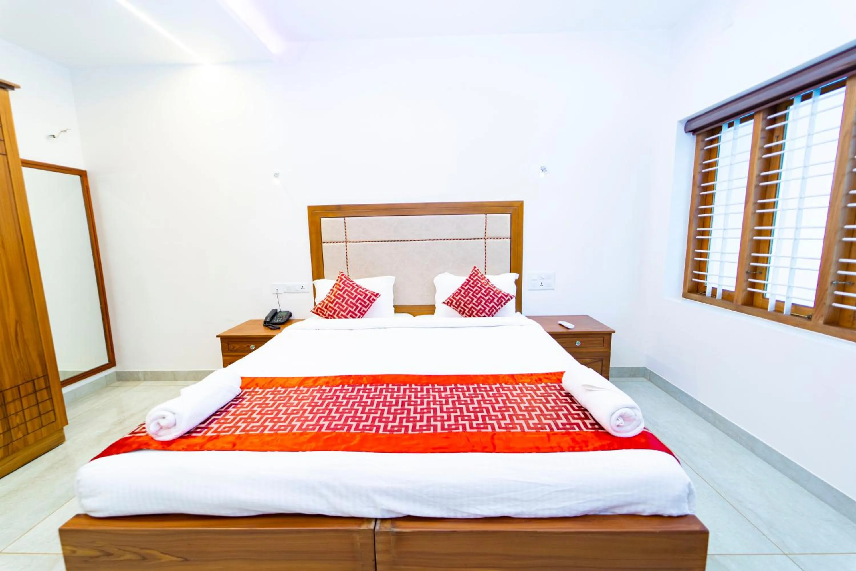 Bed in Skylar Seaview Beach Resort & Ayurveda Varkala