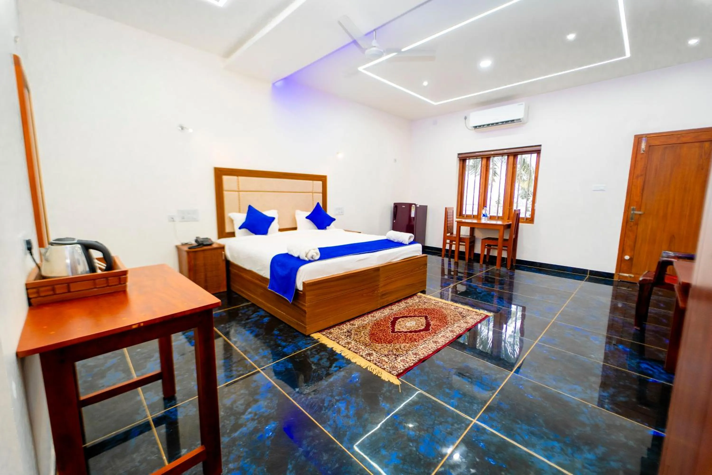 Bed in Skylar Seaview Beach Resort & Ayurveda Varkala