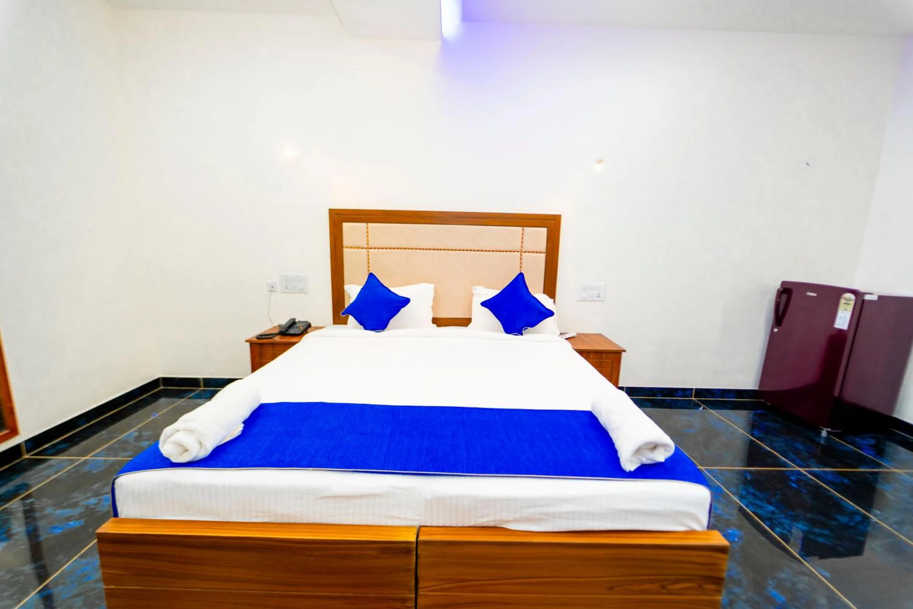 Bed in Skylar Seaview Beach Resort & Ayurveda Varkala