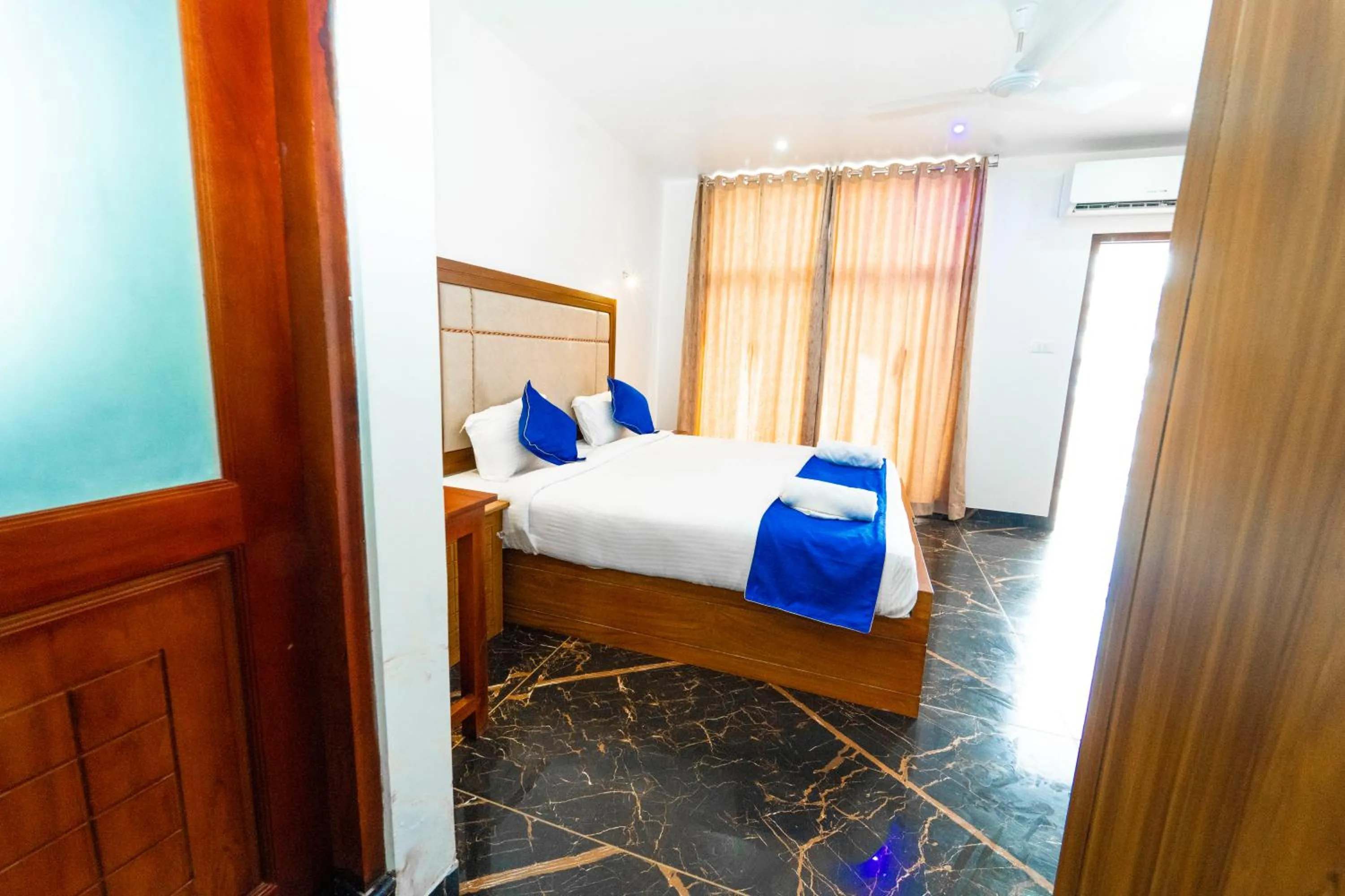 Bed in Skylar Seaview Beach Resort & Ayurveda Varkala