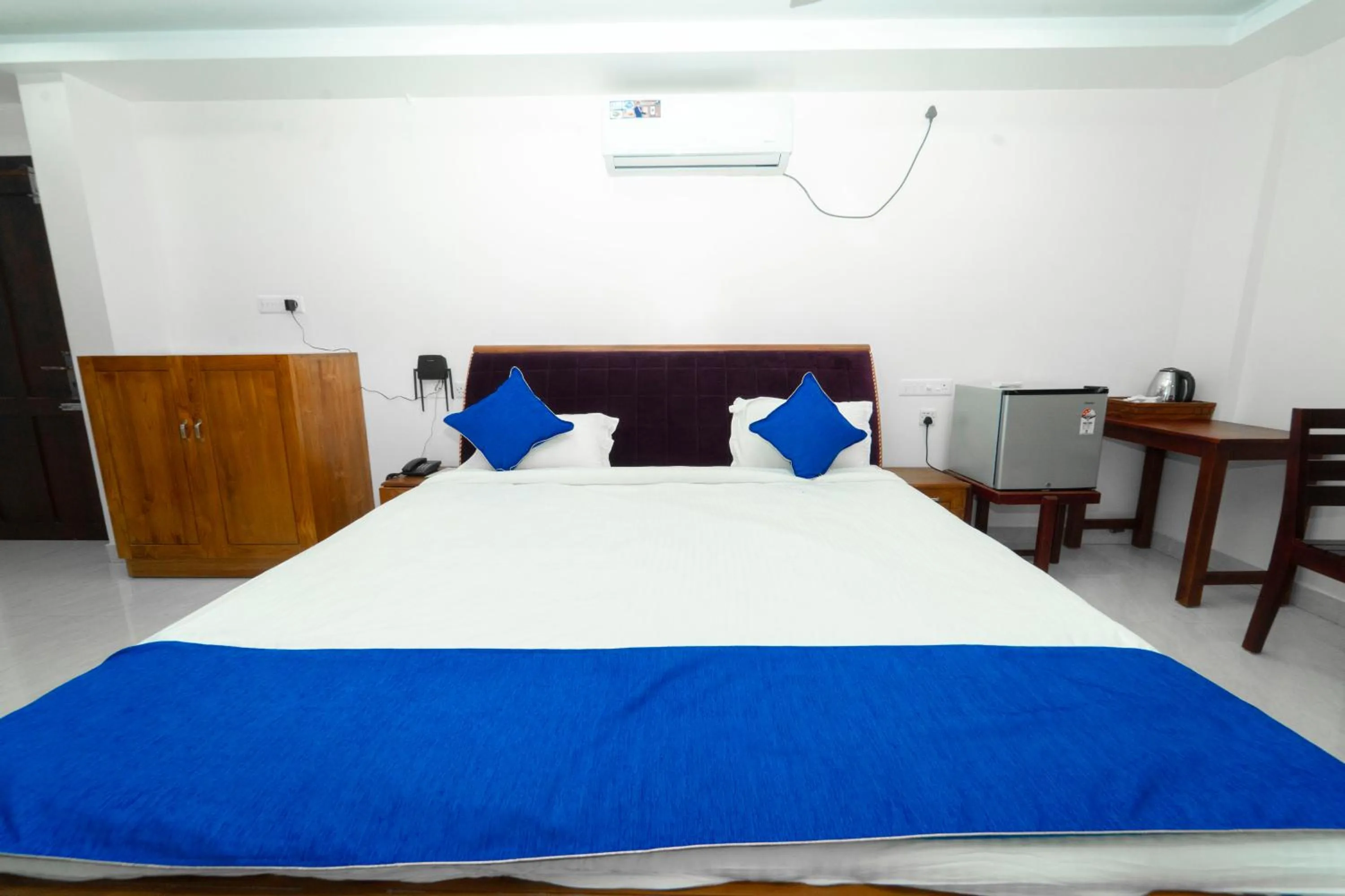 Bed in Skylar Seaview Beach Resort & Ayurveda Varkala