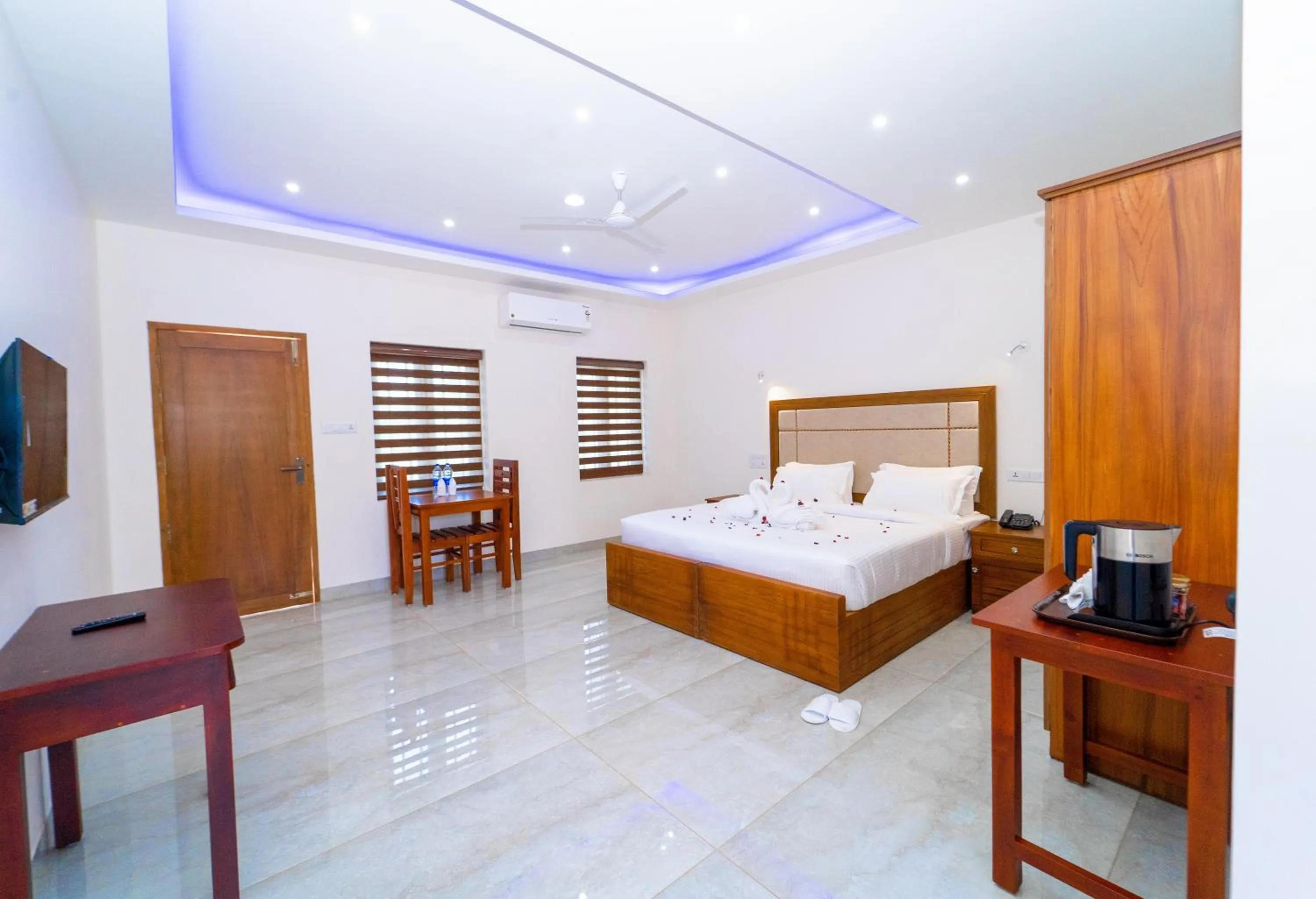 Bed in Skylar Seaview Beach Resort & Ayurveda Varkala